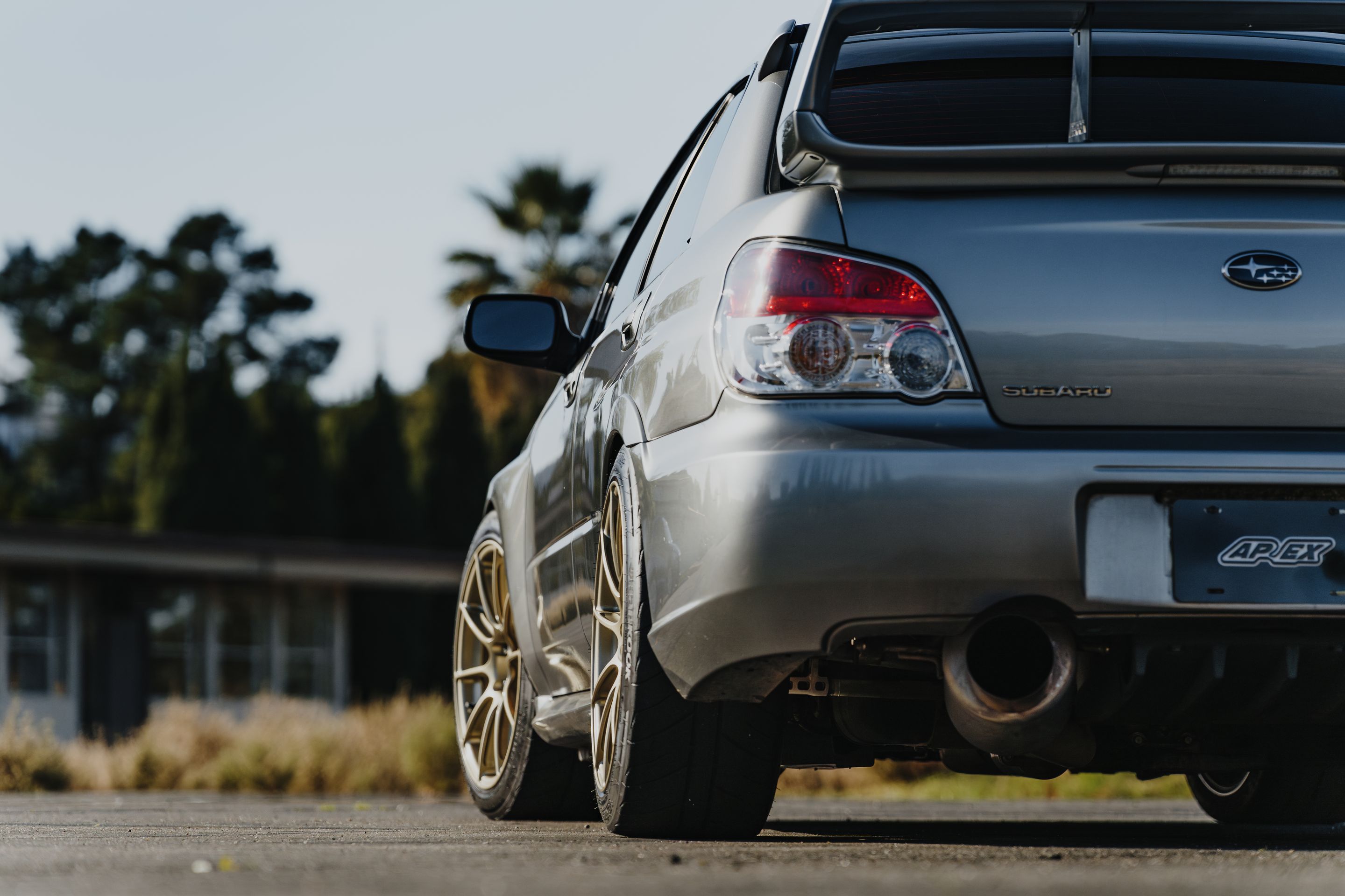 Silver Subaru GD WRX STI with 18" SM-10RS Apex wheels in Motorsport Gold