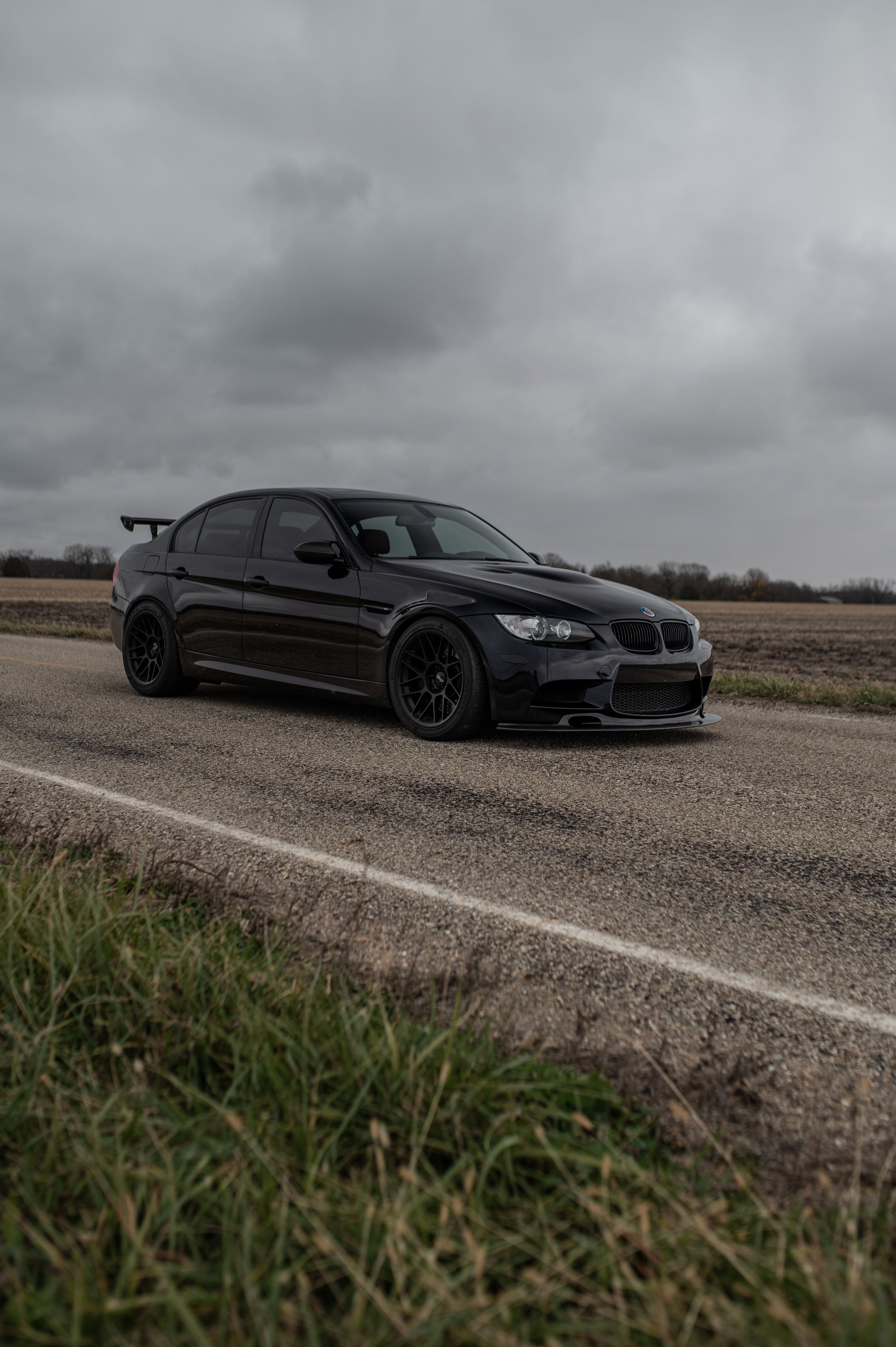 Black BMW E90 Sedan M3 with 18" ARC-8 Apex wheels in Satin Black