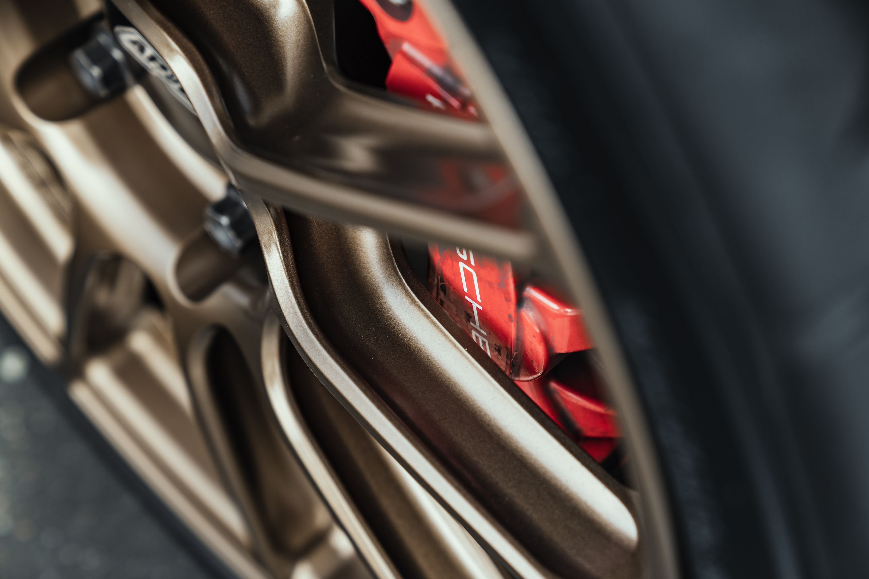 Grey Porsche 718 Cayman S with 19" SM-10RS Apex wheels in Satin Bronze