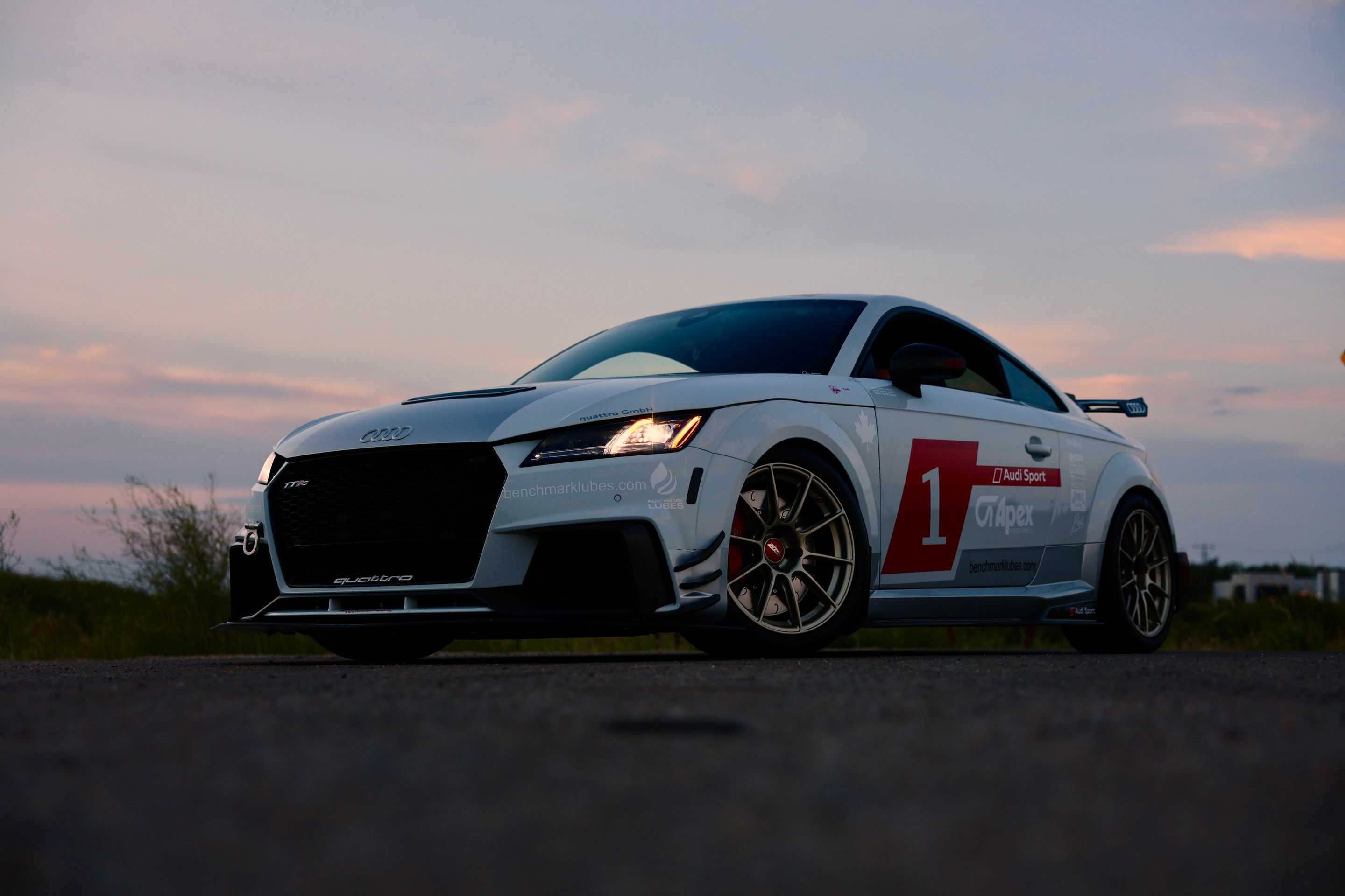 White Audi FV/8S TT RS with 18" SM-10RS Apex wheels in Motorsport Gold