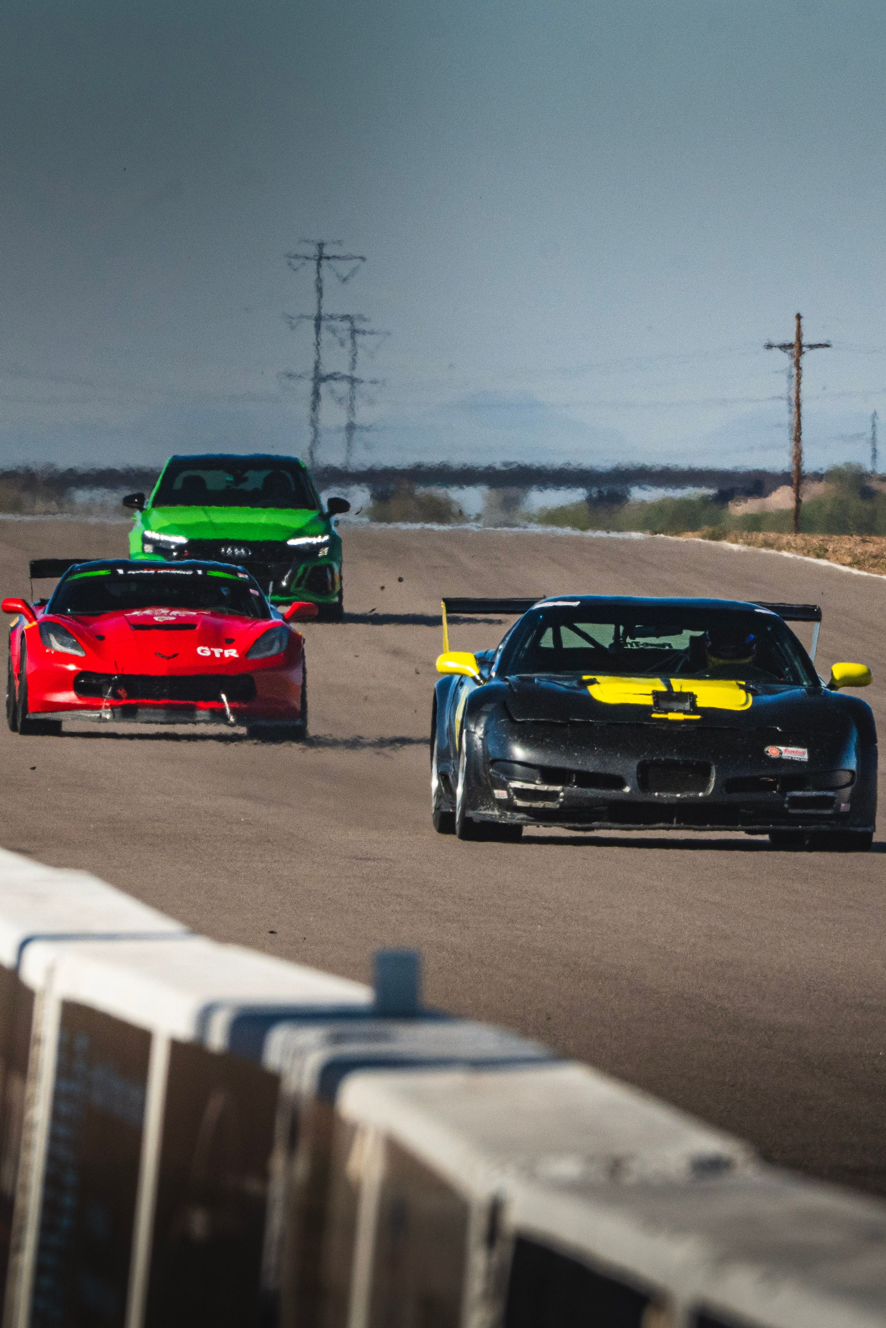 Green Audi 8Y RS 3 with 18" VS-5RS Apex wheels in Brushed Clear