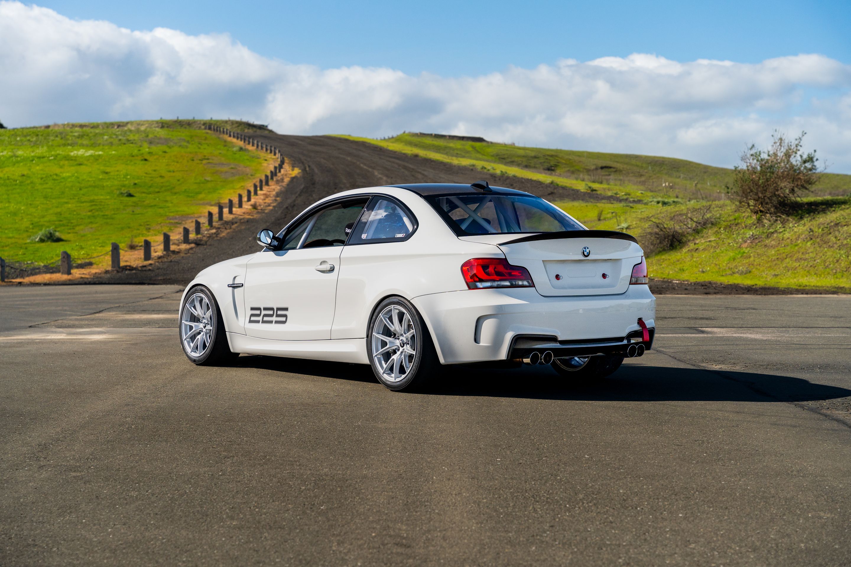 White BMW E82 1M with 18" VS-5 Apex wheels in Race Silver