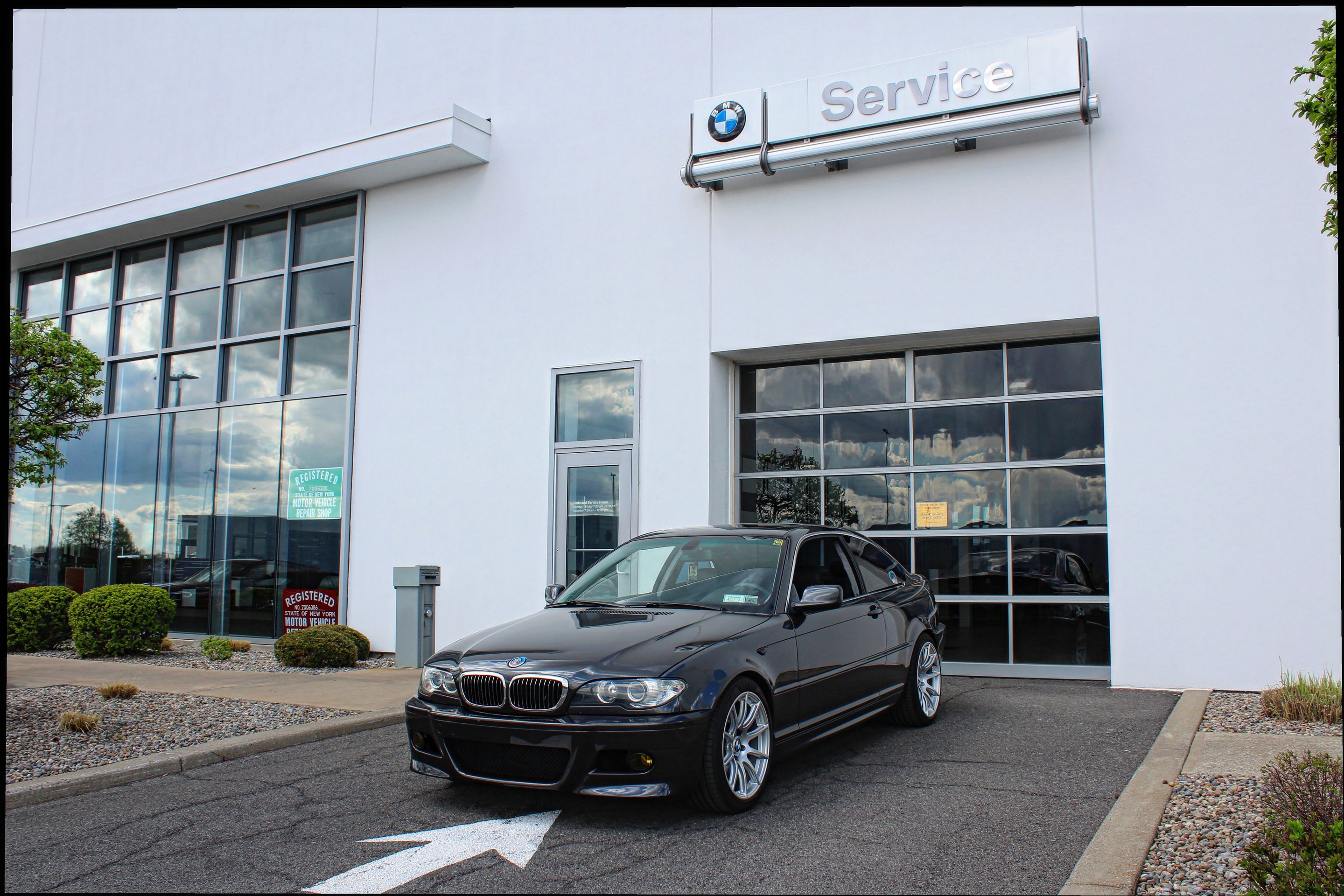 Black BMW E46 3 Series with 18" SM-10 Apex wheels in Race Silver