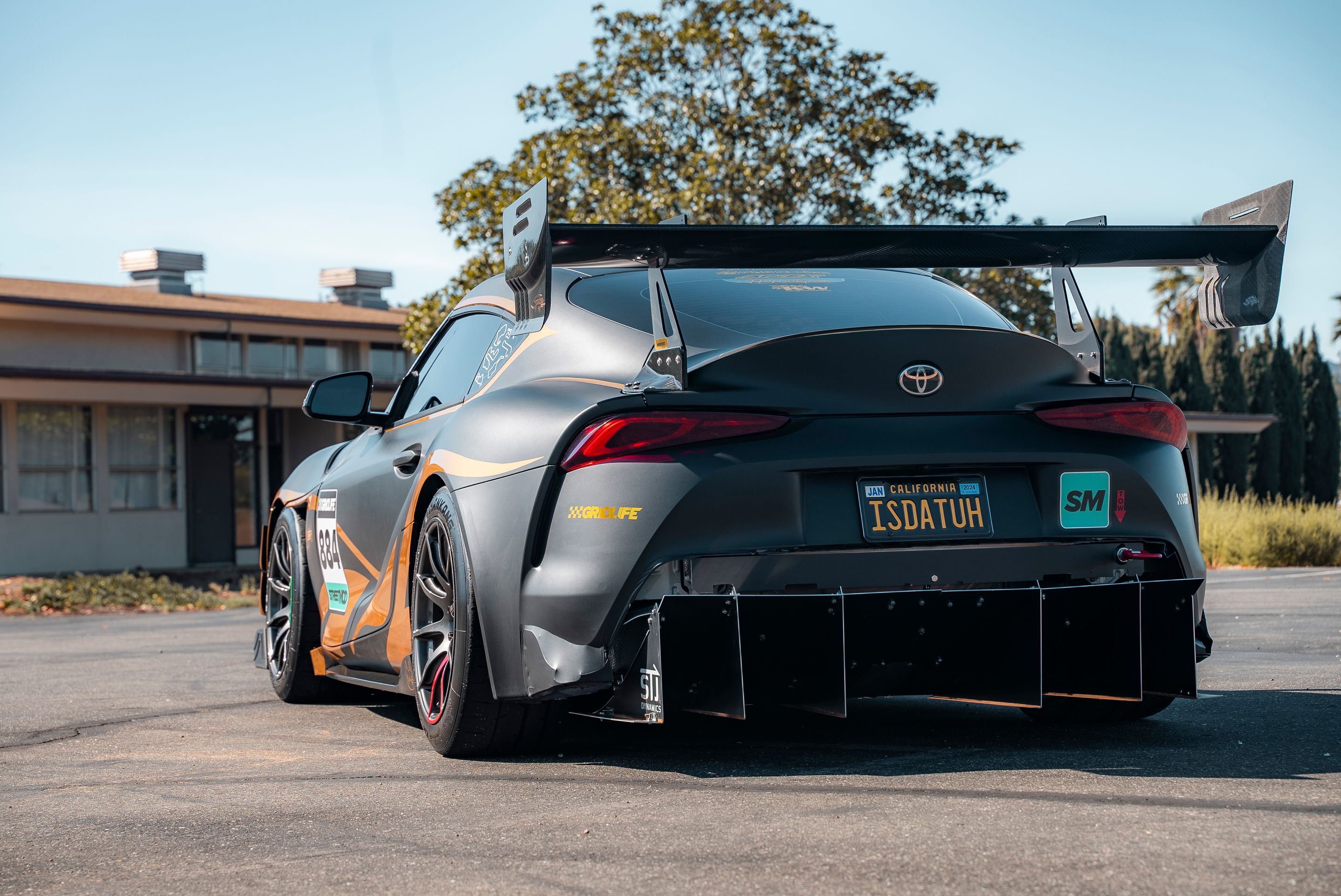 Grey Toyota GR Supra with 18" SM-10 Apex wheels in Anthracite