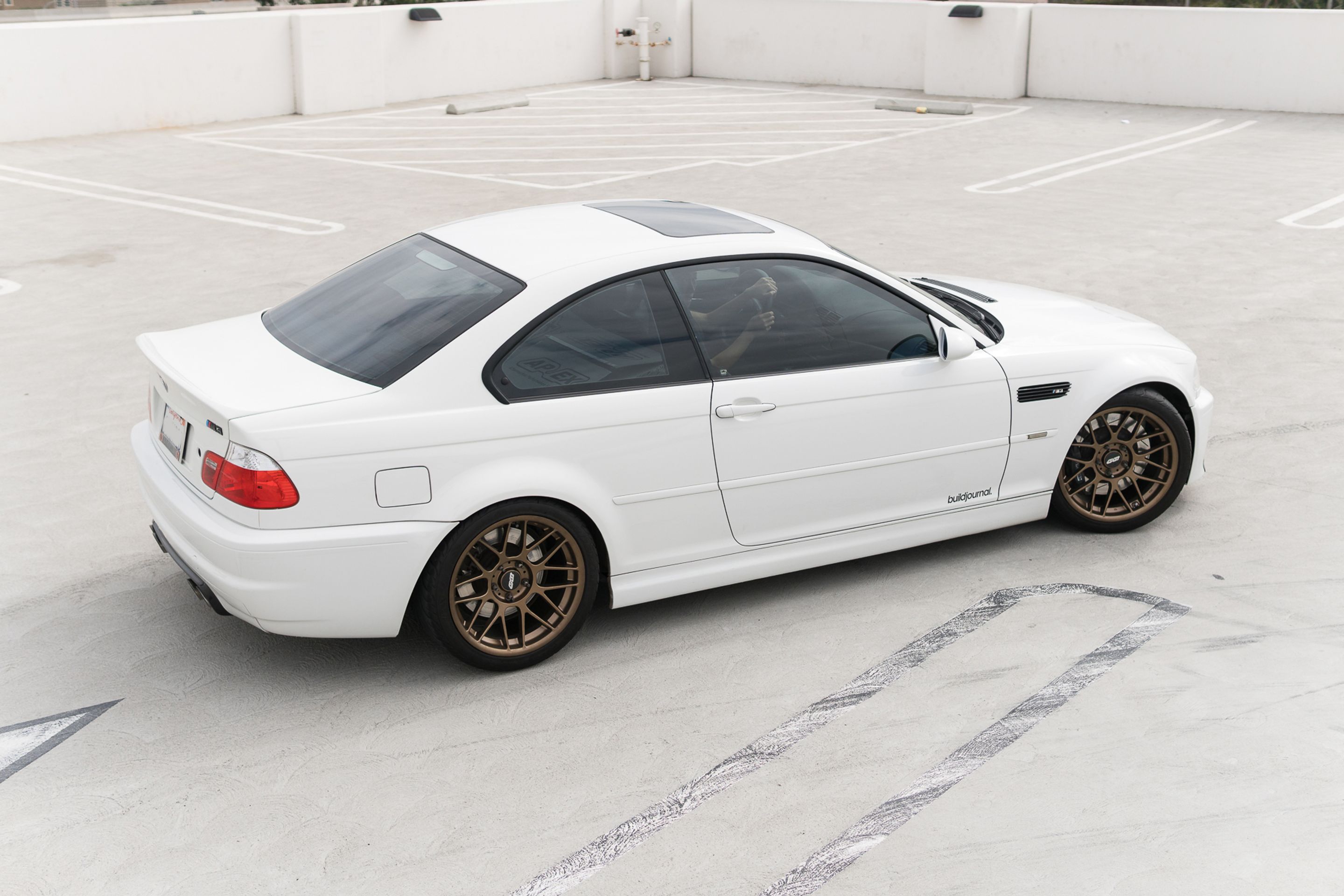 White BMW E46 M3 with 18" ARC-8 Apex wheels in Satin Bronze