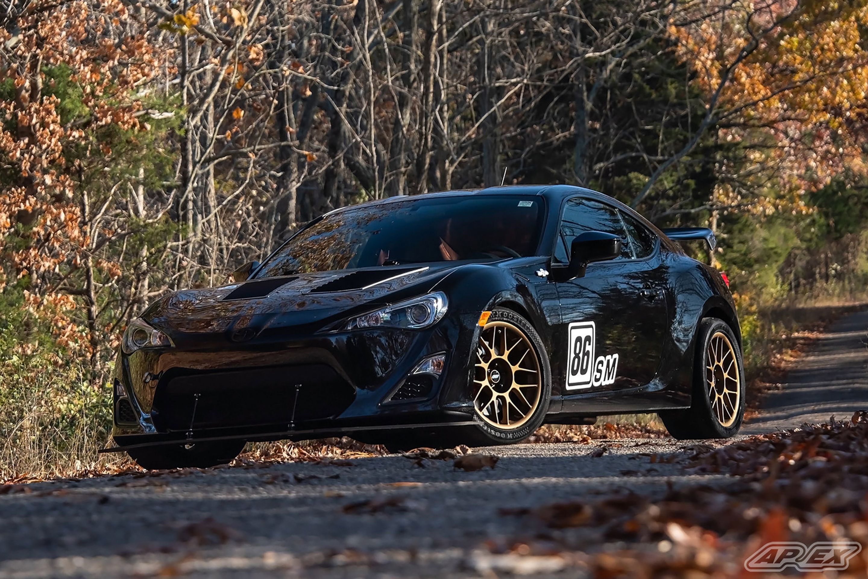 Black Scion FR-S with 17" ARC-8 Apex wheels in Satin Bronze