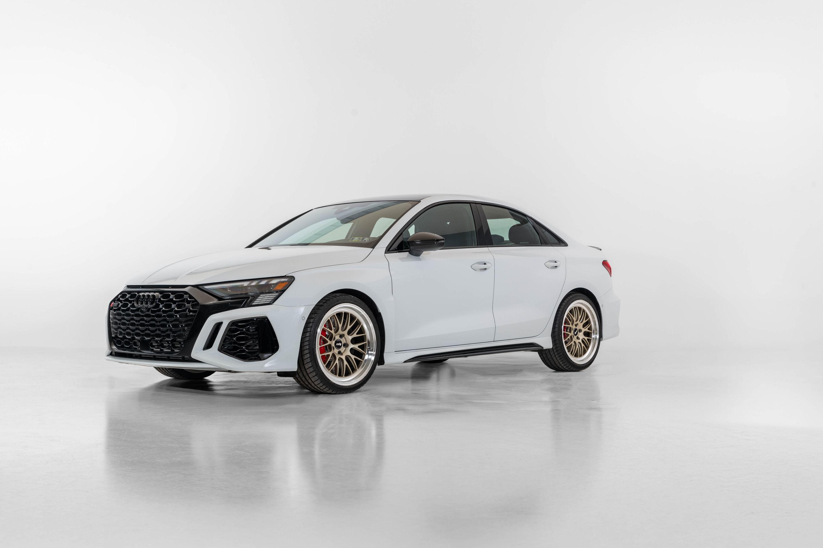 Race Livery Audi 8Y RS 3 with 19" ML-10RT Apex wheels in Machined Lip Gloss Motorsport Gold