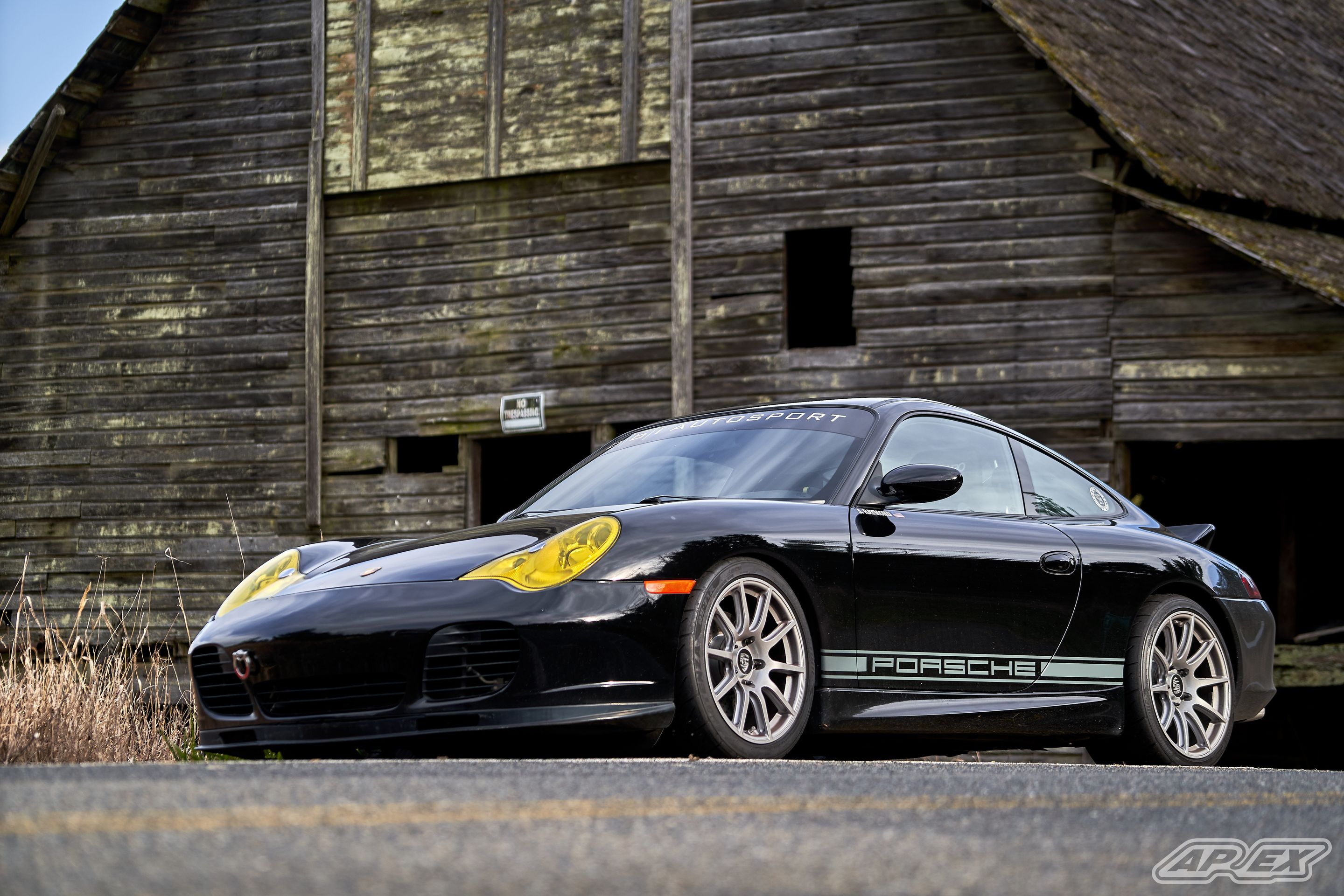 Black Porsche 911 996 Carrera with 18" SM-10 Apex wheels in Race Silver