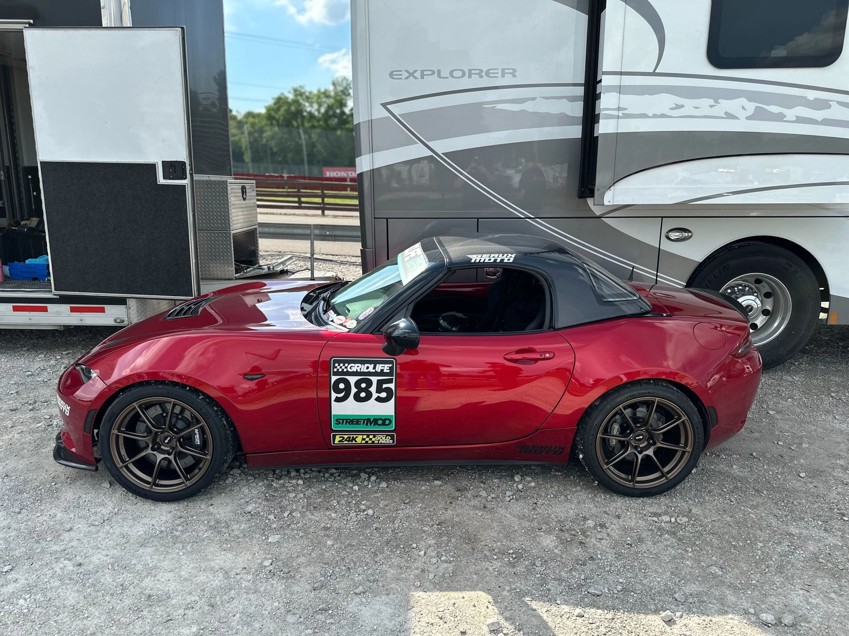 Red Mazda ND MX-5 Miata with 17" SM-8RS Apex wheels in Satin Bronze