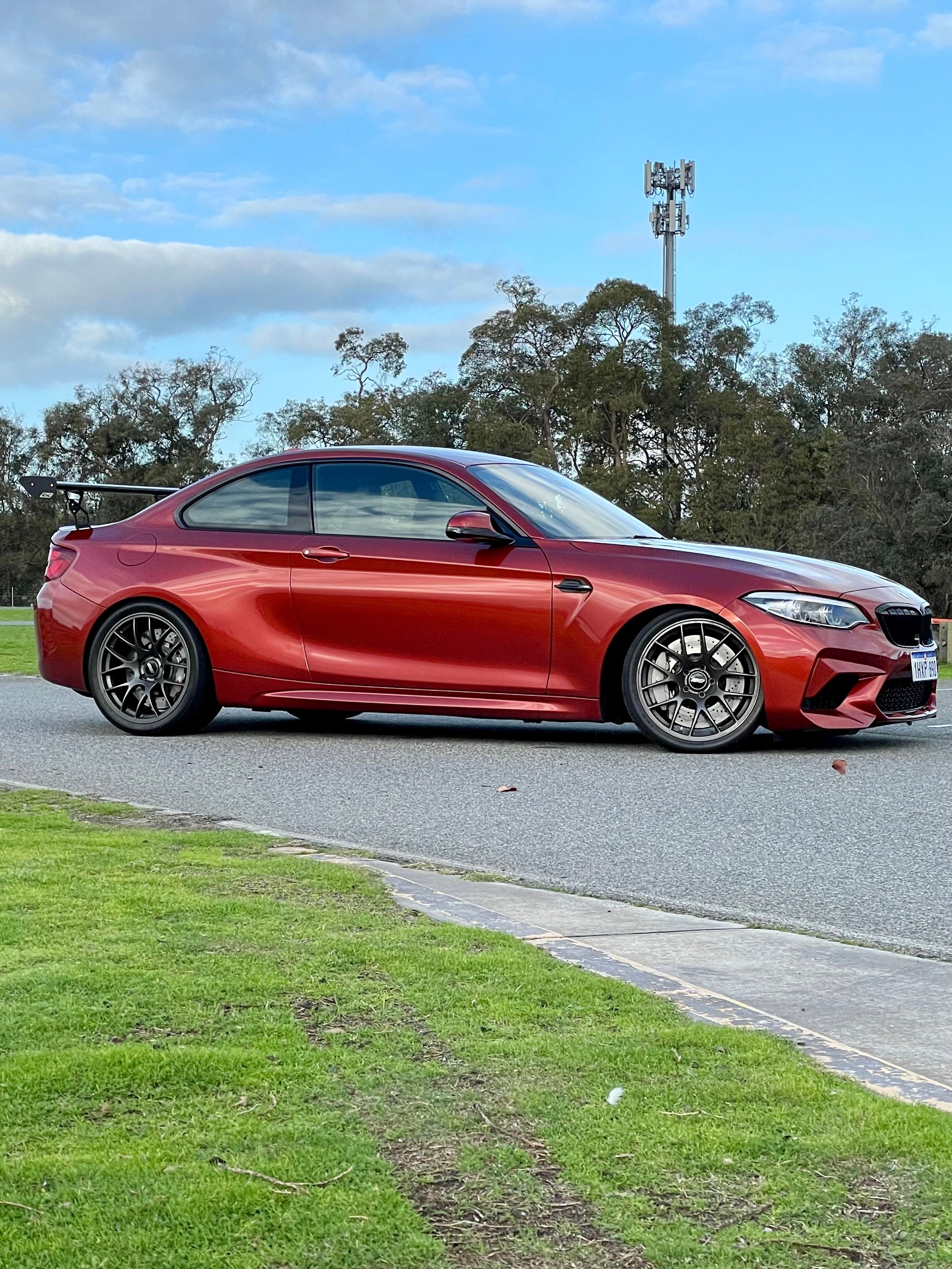 Orange BMW F87 M2 with 19" EC-7 Apex wheels in Anthracite