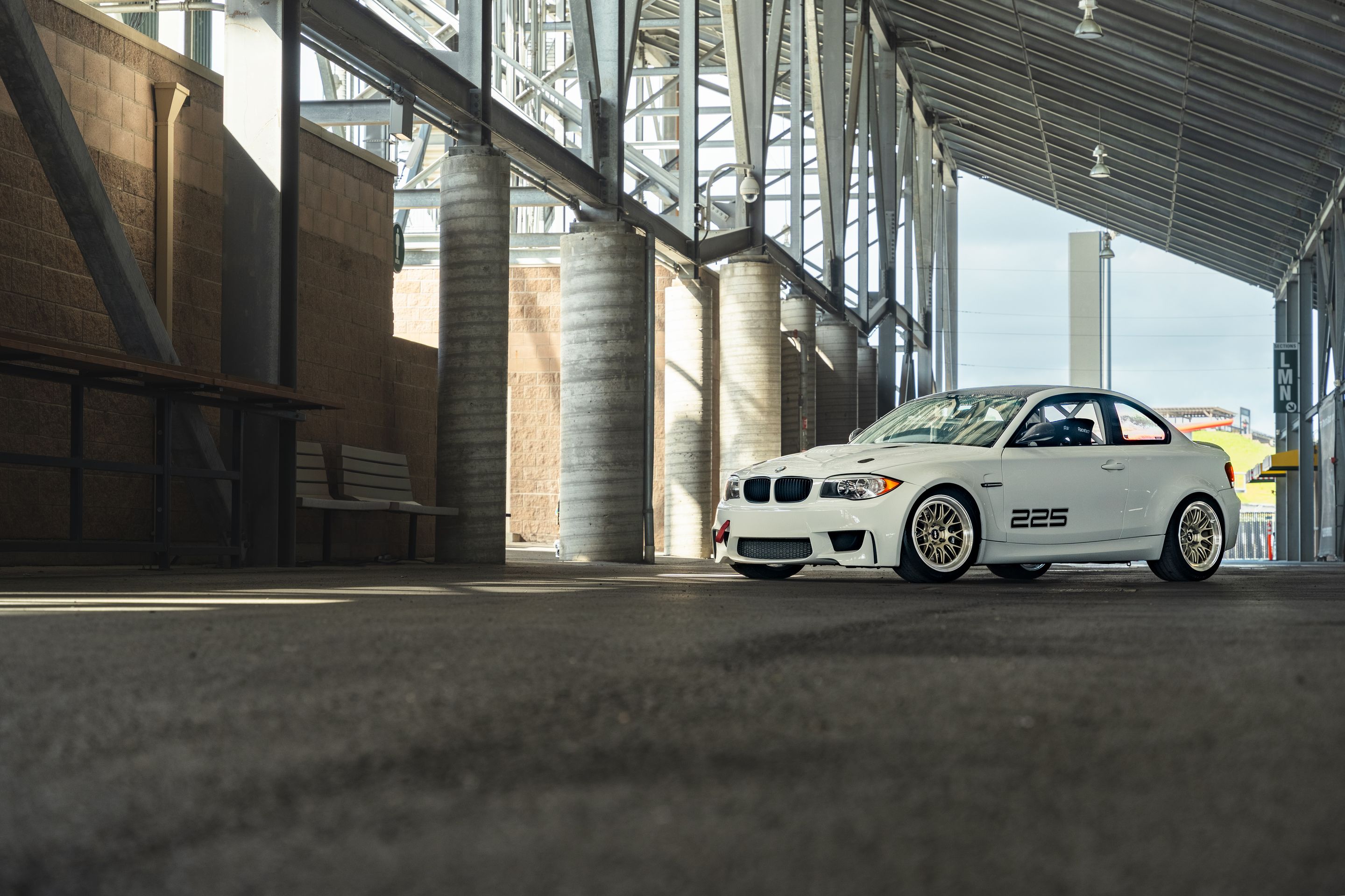 White BMW E82 1M with 18" ML-10RT Apex wheels in Machined Lip Gloss Motorsport Gold