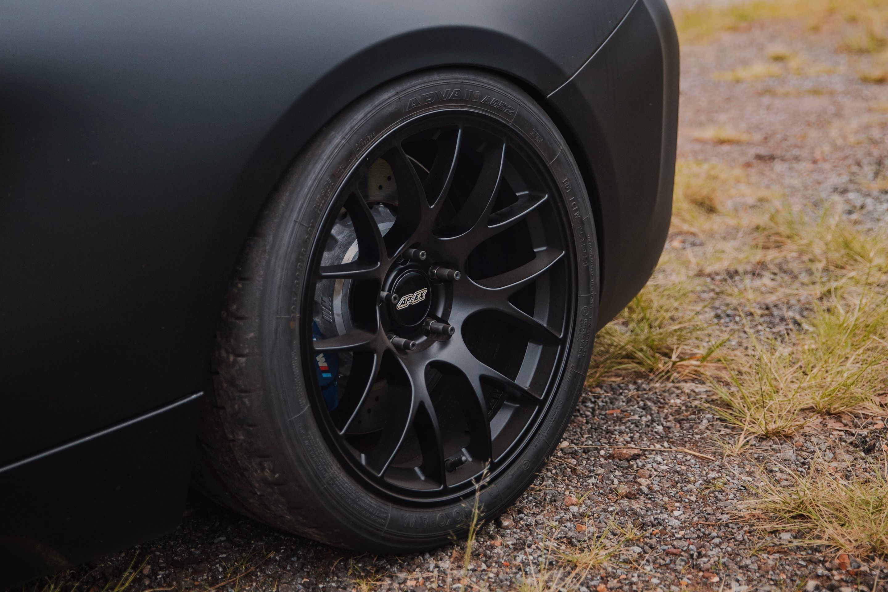 Black BMW F87 M2 with 18" EC-7 Apex wheels in Satin Black