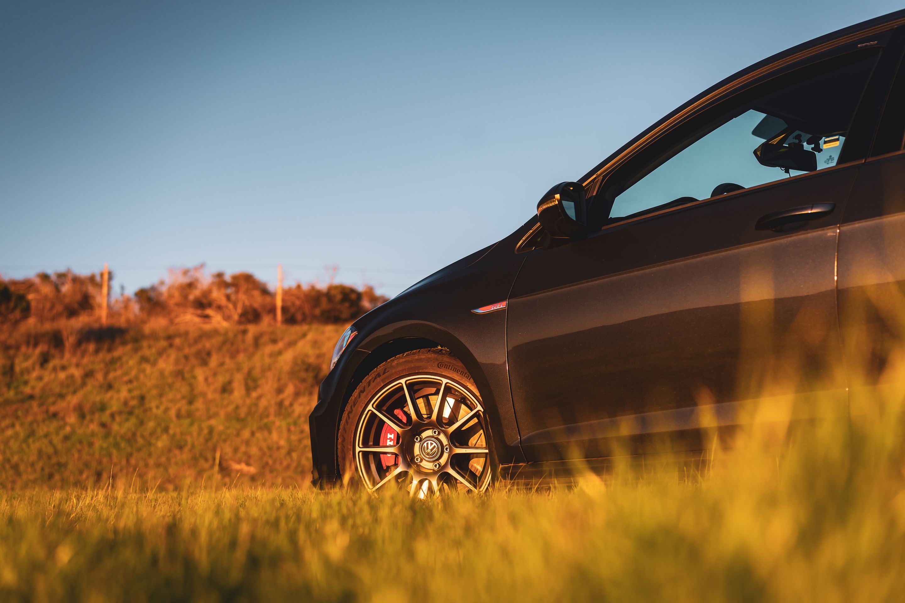 Black VW MK7 GTI with 17" SM-10 Apex wheels in Anthracite