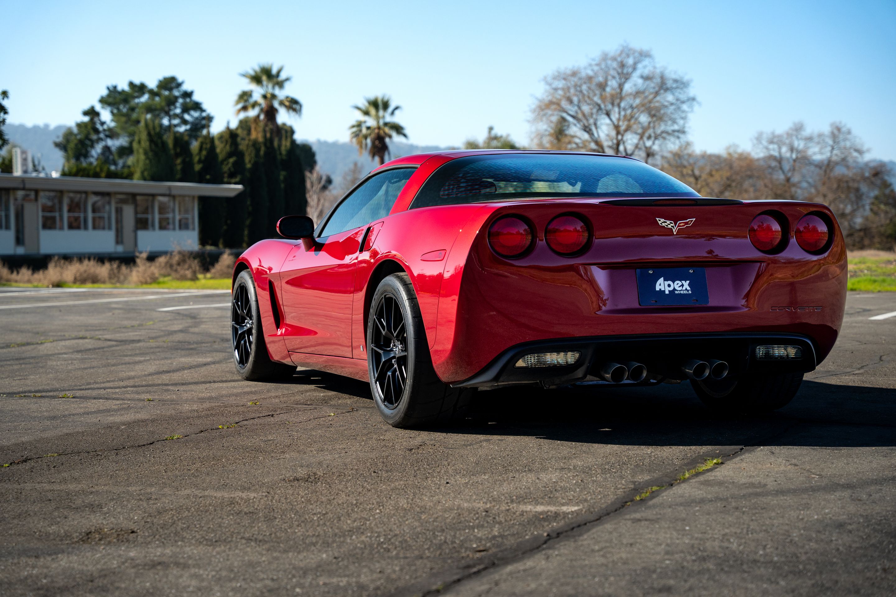Red Chevrolet C6 Corvette Base/Z51 with 18" VS-5 Apex wheels in Satin Black