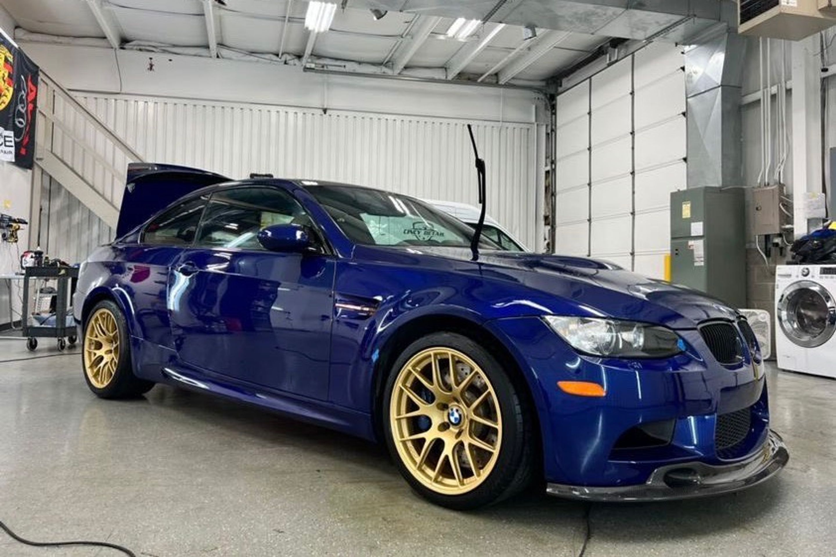 Blue BMW E92 Coupe M3 with 18" EC-7R Apex wheels in Satin Gold