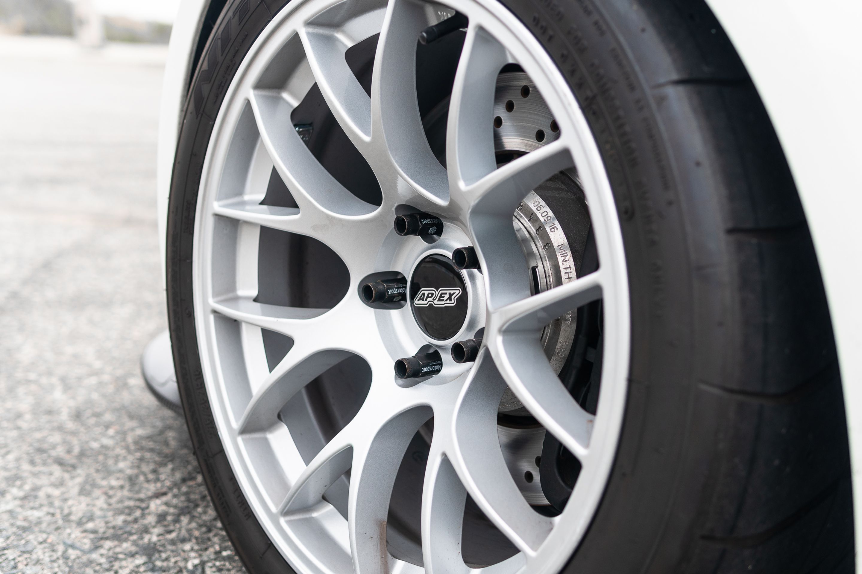 White BMW E92 Coupe M3 with 18" EC-7 Apex wheels in Race Silver