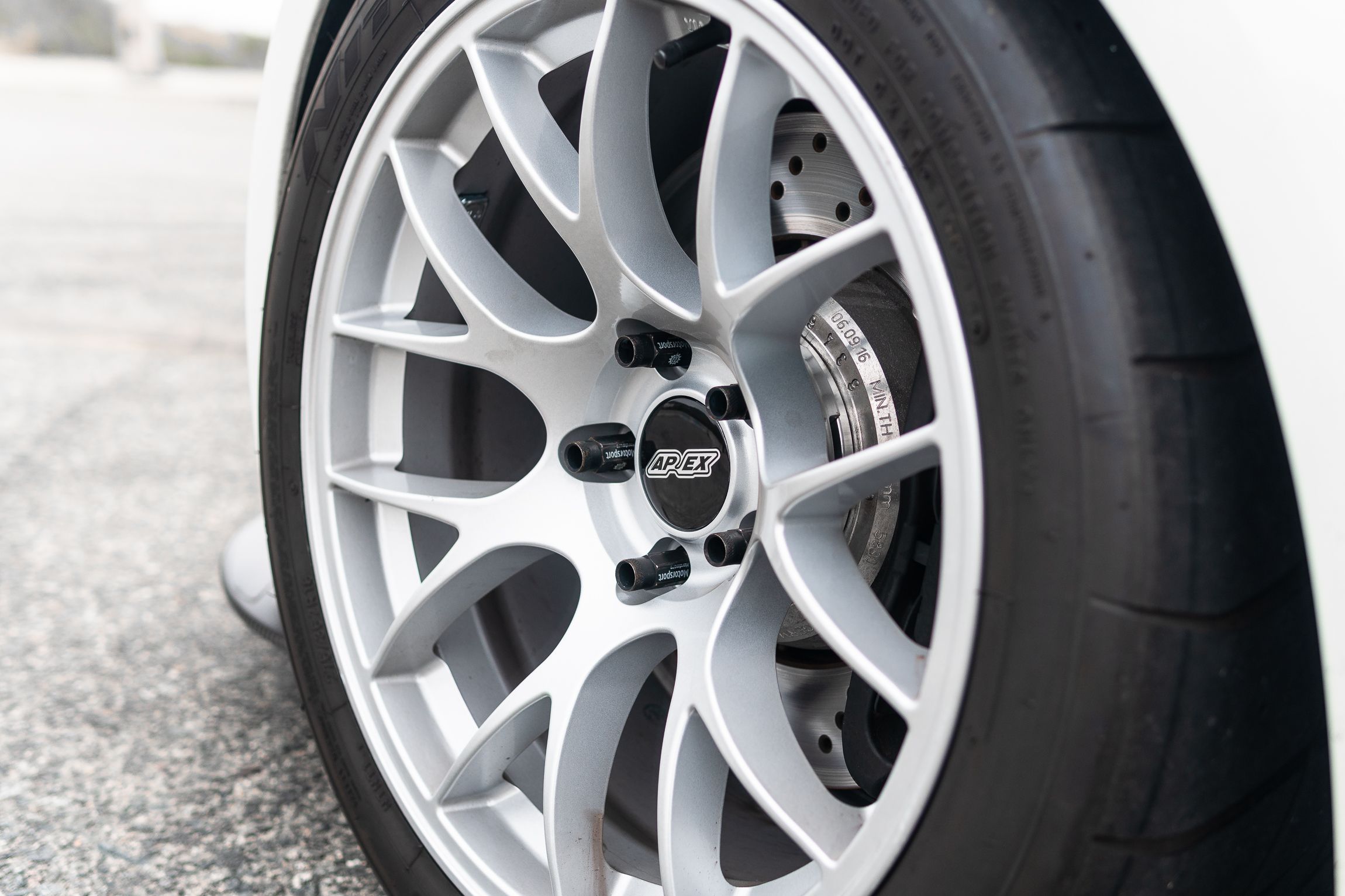 White BMW E92 Coupe M3 with 18" EC-7 Apex wheels in Race Silver