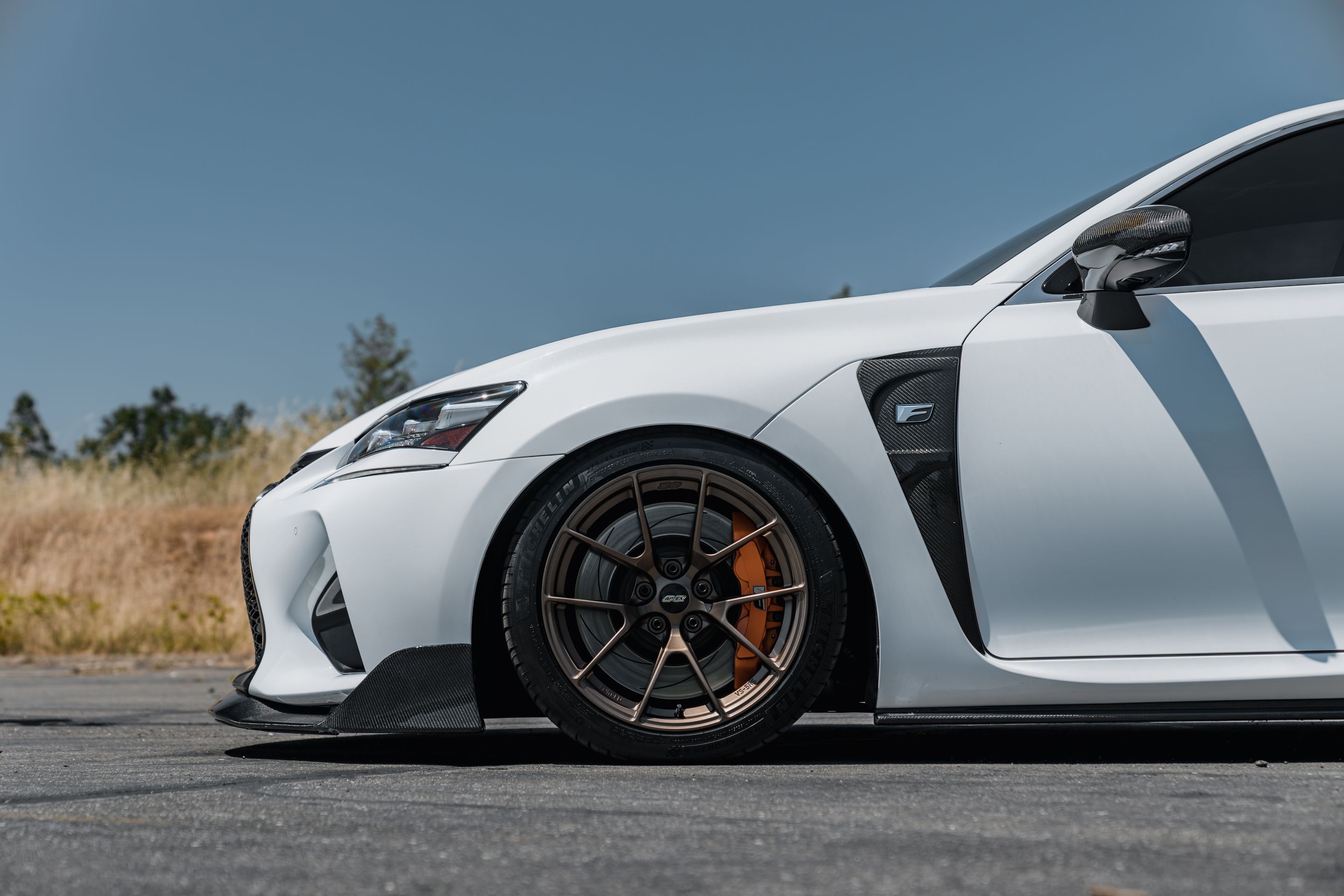 White Lexus URL10 GS-F with 18" VS-5RS Apex wheels in Satin Bronze