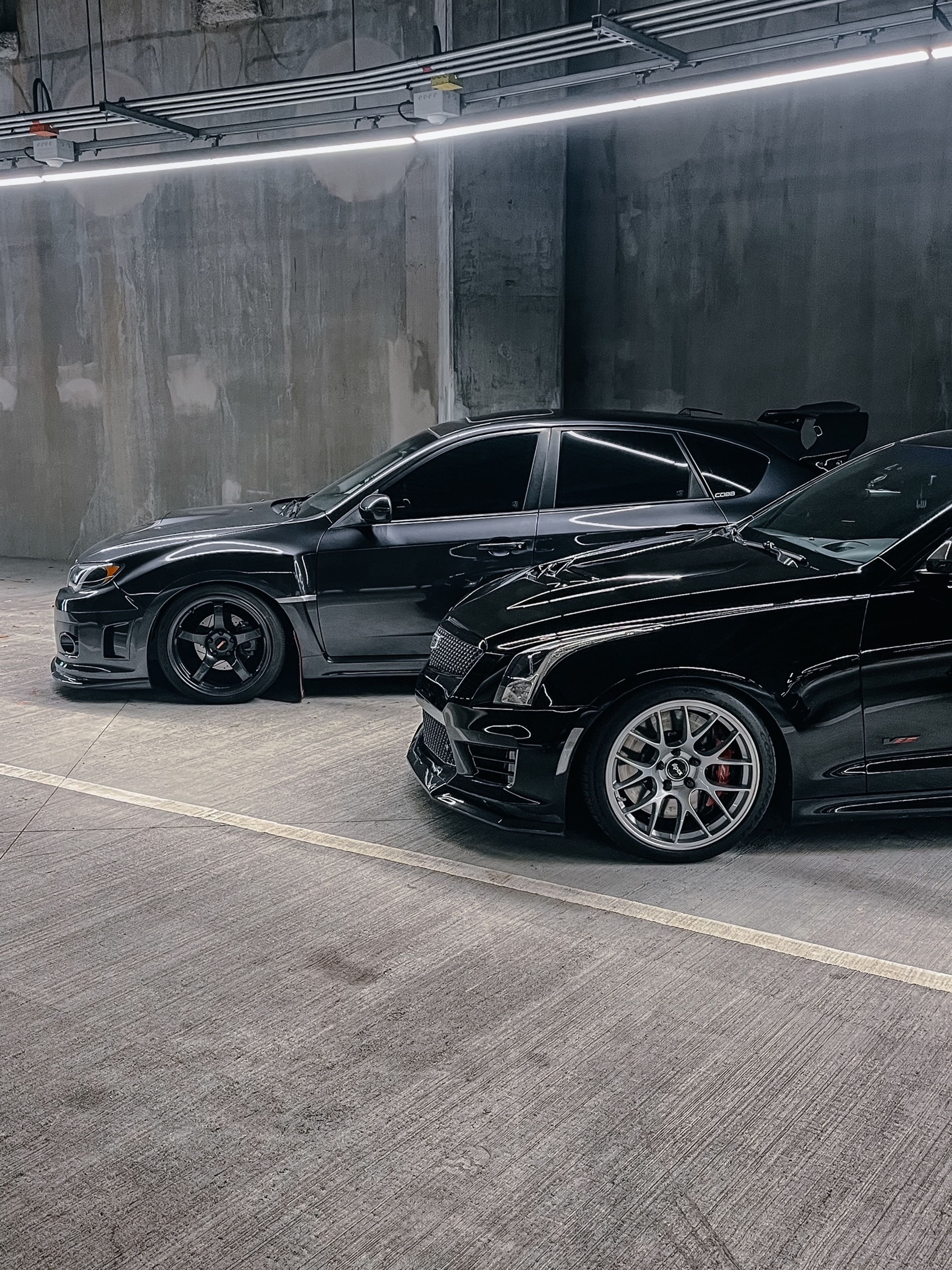 Black Cadillac ATS-V with 18" EC-7 Apex wheels in Race Silver