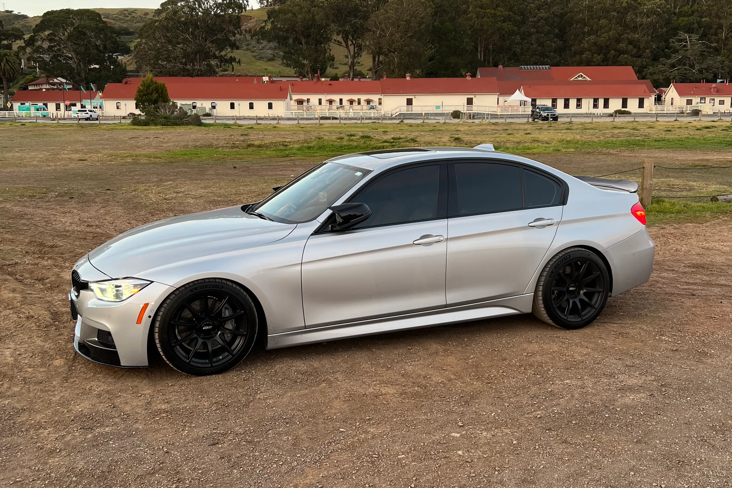 Silver BMW F30 Sedan 3 Series with 18" SM-10 Apex wheels in Satin Black
