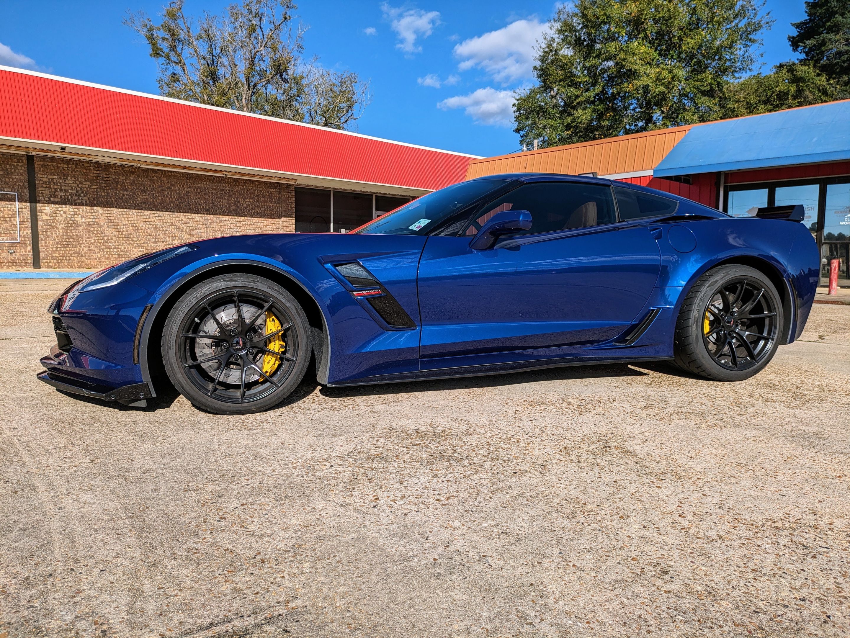 Blue Chevrolet C7 Corvette Grand Sport with 18"/19" VS-5RS Apex wheels in Satin Black