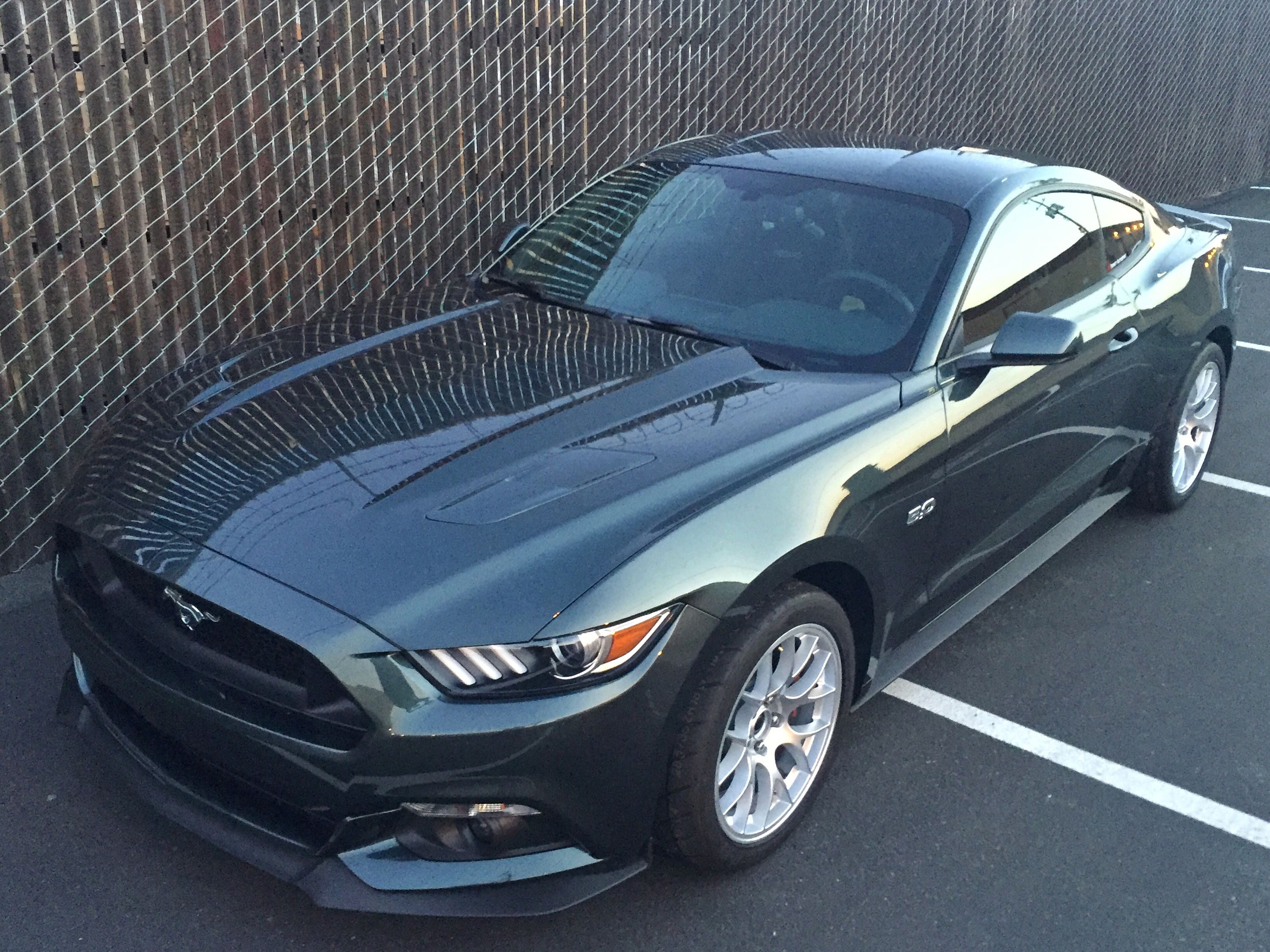 Green Ford S550 Mustang GT with 18" EC-7 Apex wheels in Race Silver