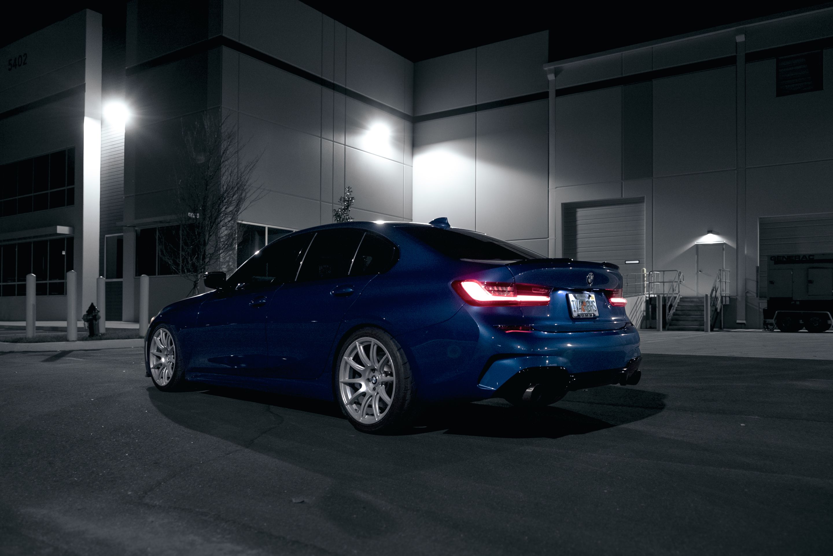 Blue BMW G20 Sedan 3 Series with 19" SM-10 Apex wheels in Race Silver