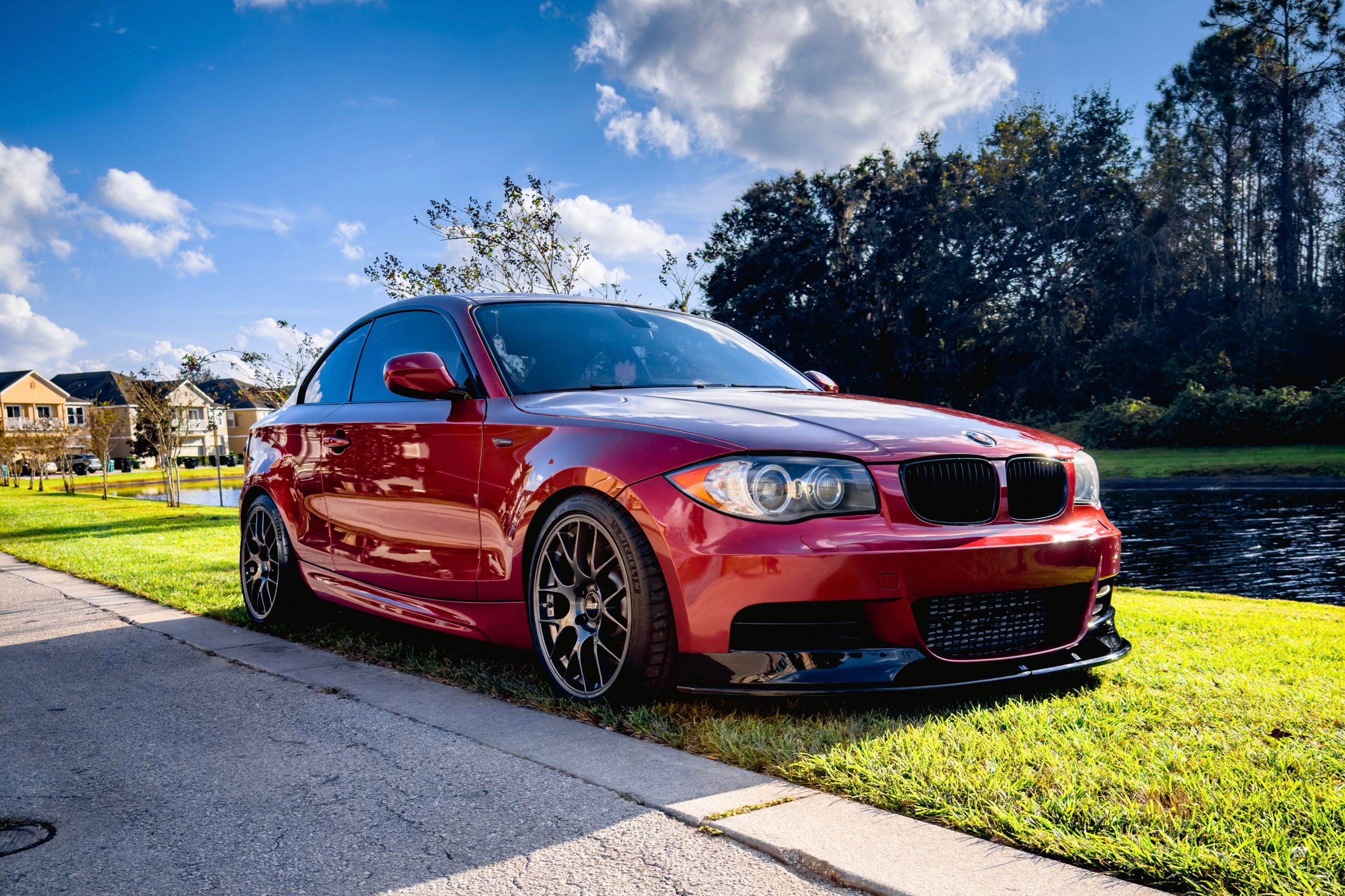 Orange BMW E82 Coupe 1 Series with 18" EC-7 Apex wheels in Anthracite