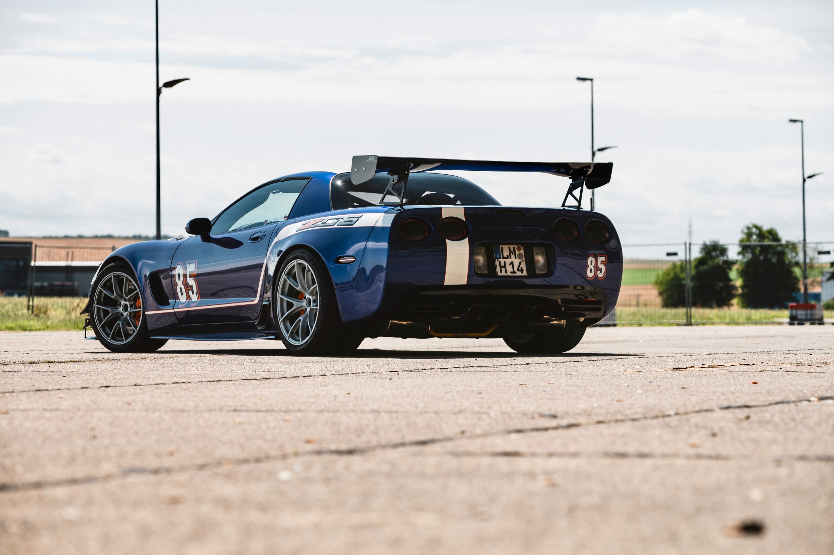 Blue Chevrolet C5 Corvette Z06 with 18"/19" VS-5RS Apex wheels in Custom Finish