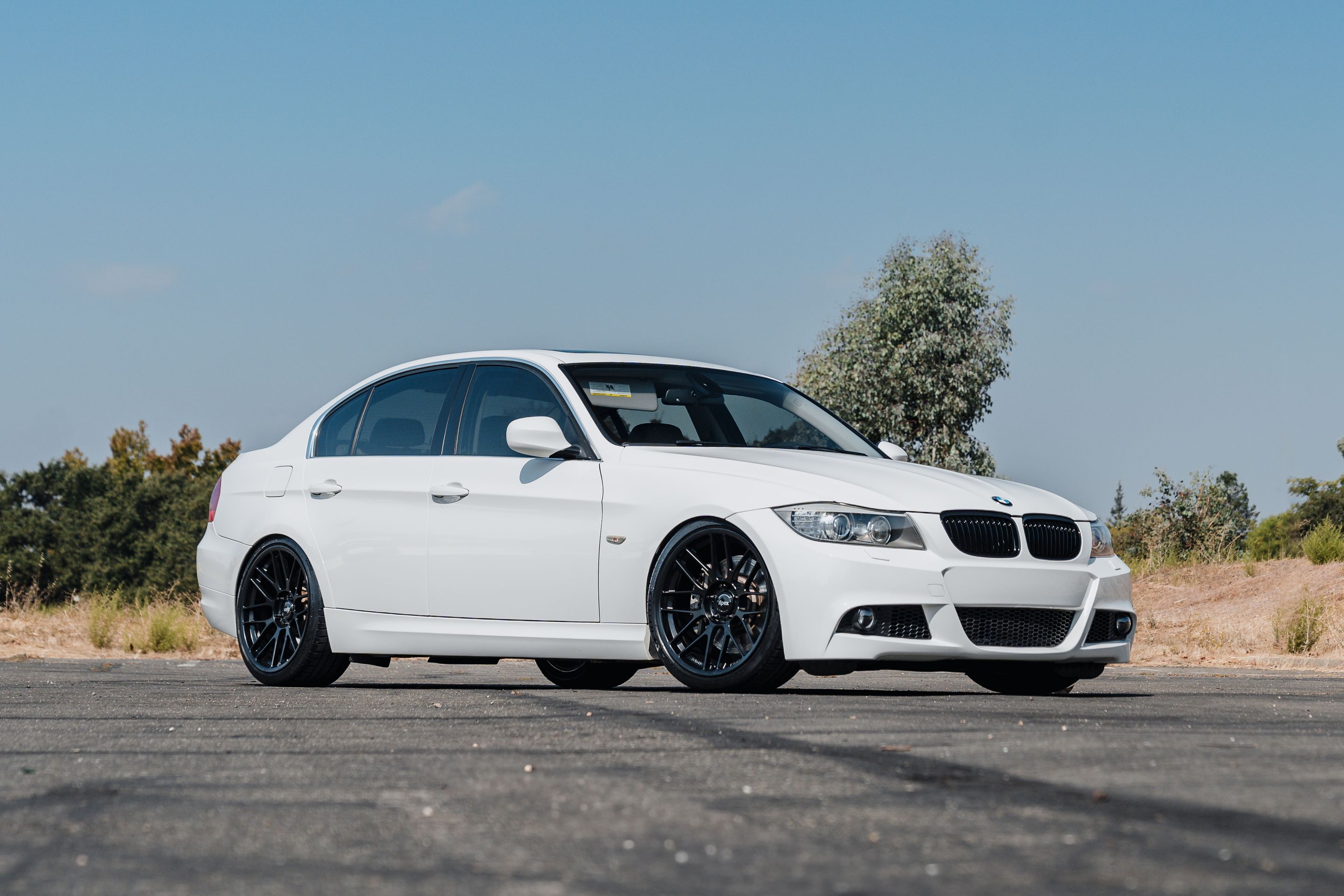 White BMW E90 LCI Sedan 3 Series with 19" ARC-8RT Apex wheels in Satin Black