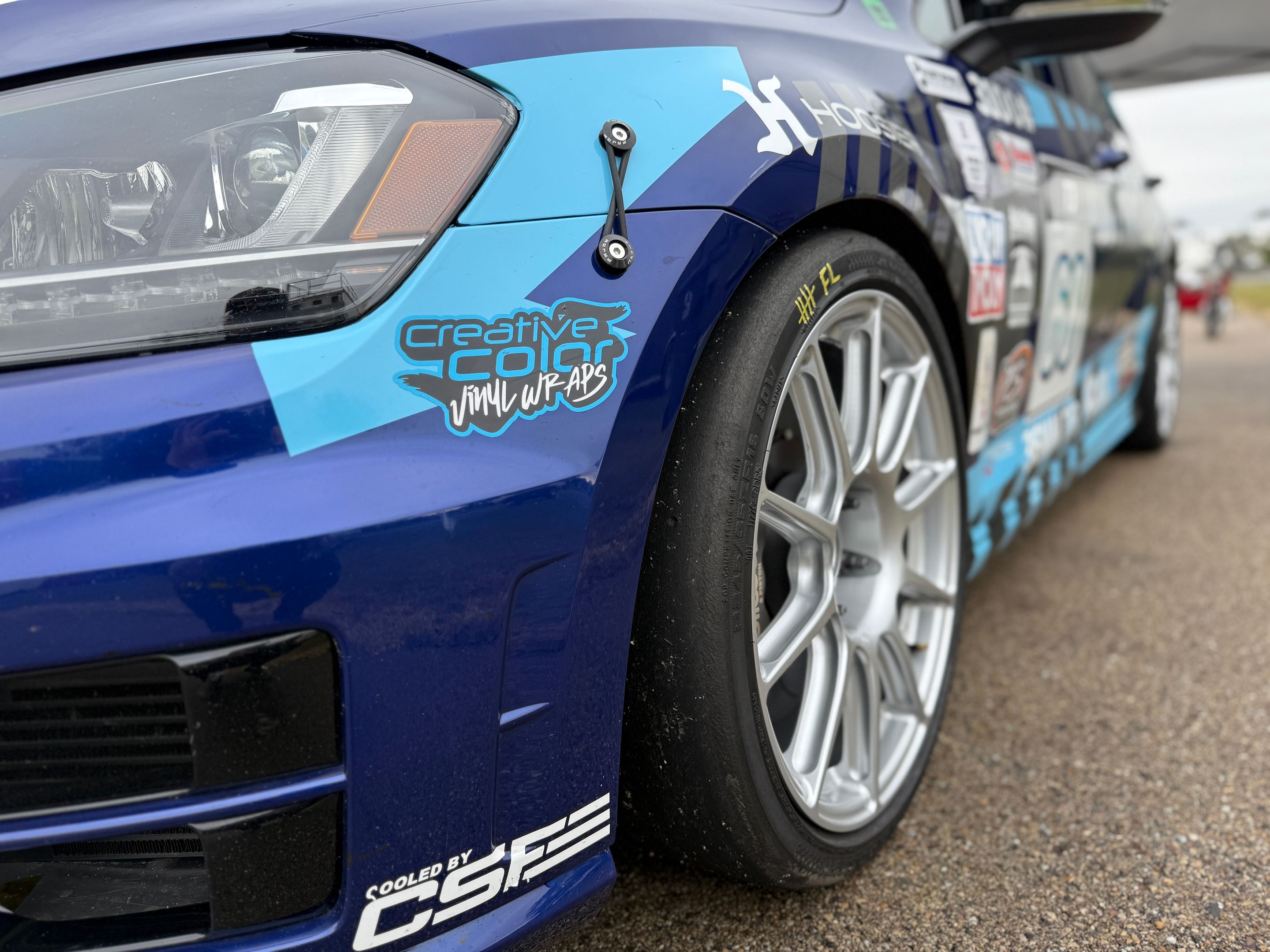 Race Livery VW MK7 Golf R with 18" SM-10 Apex wheels in Race Silver