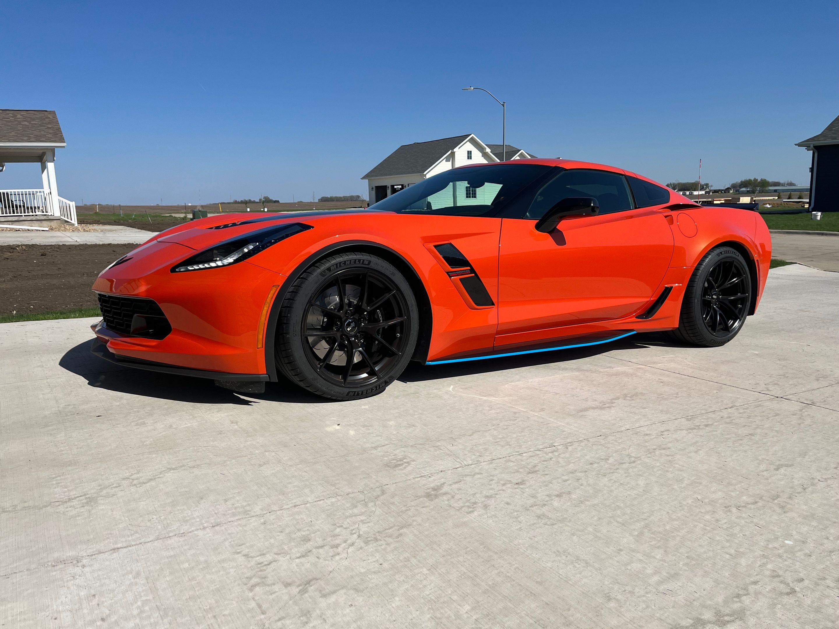 Orange Chevrolet C7 Corvette Grand Sport with 19" VS-5RS Apex wheels in Satin Black