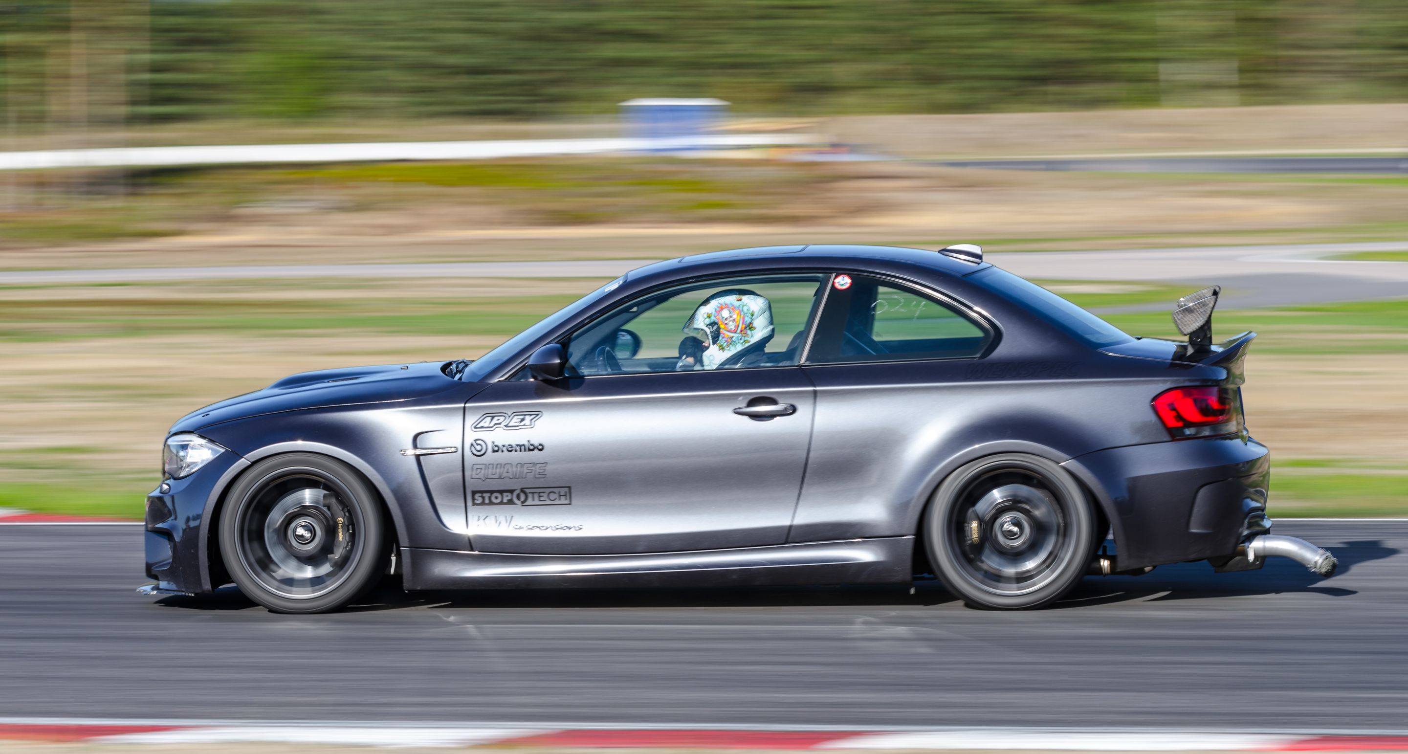 Grey BMW E82 1M with 18" SM-10 Apex wheels in Satin Black