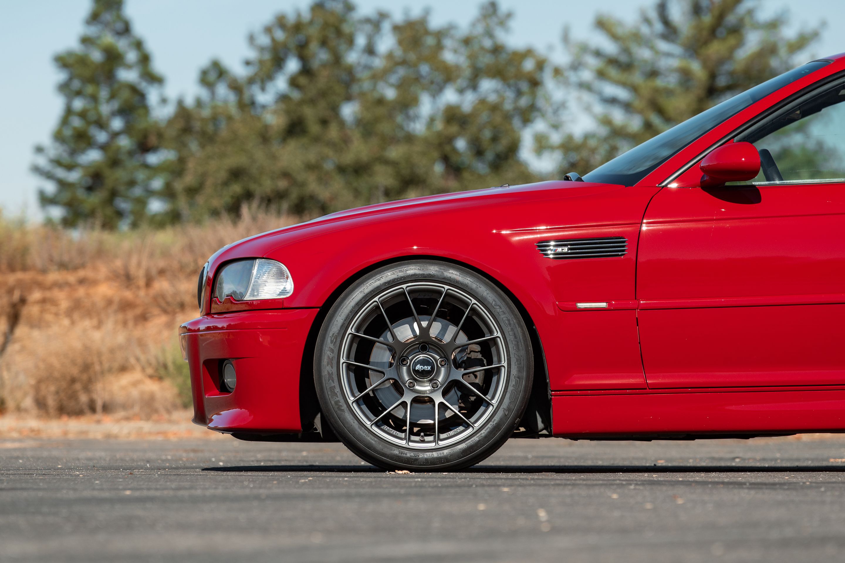 Red BMW E46 M3 with 18" EC-7RS Apex wheels in Anthracite
