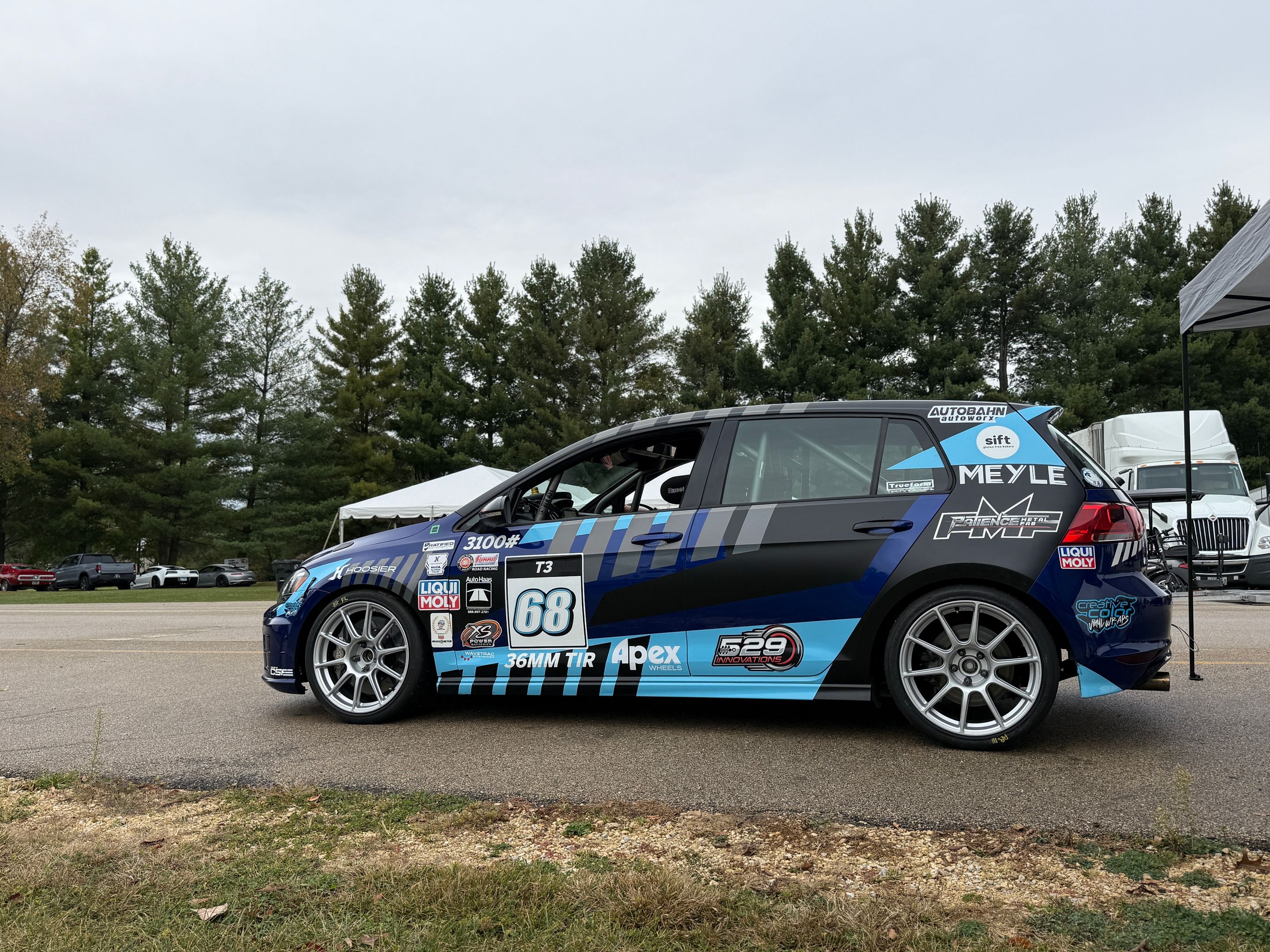 Race Livery VW MK7 Golf R with 18" SM-10 Apex wheels in Race Silver