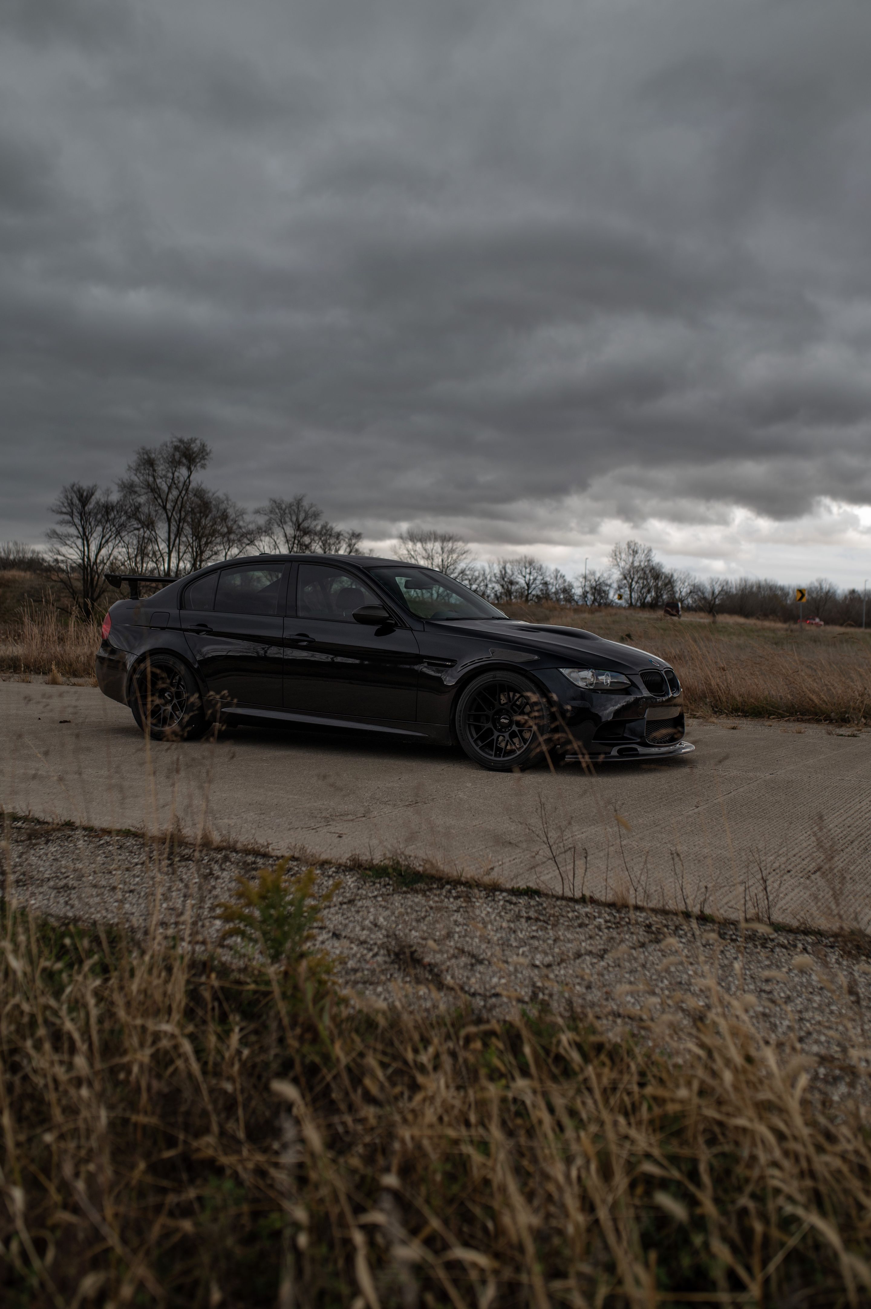 Black BMW E90 Sedan M3 with 18" ARC-8 Apex wheels in Satin Black