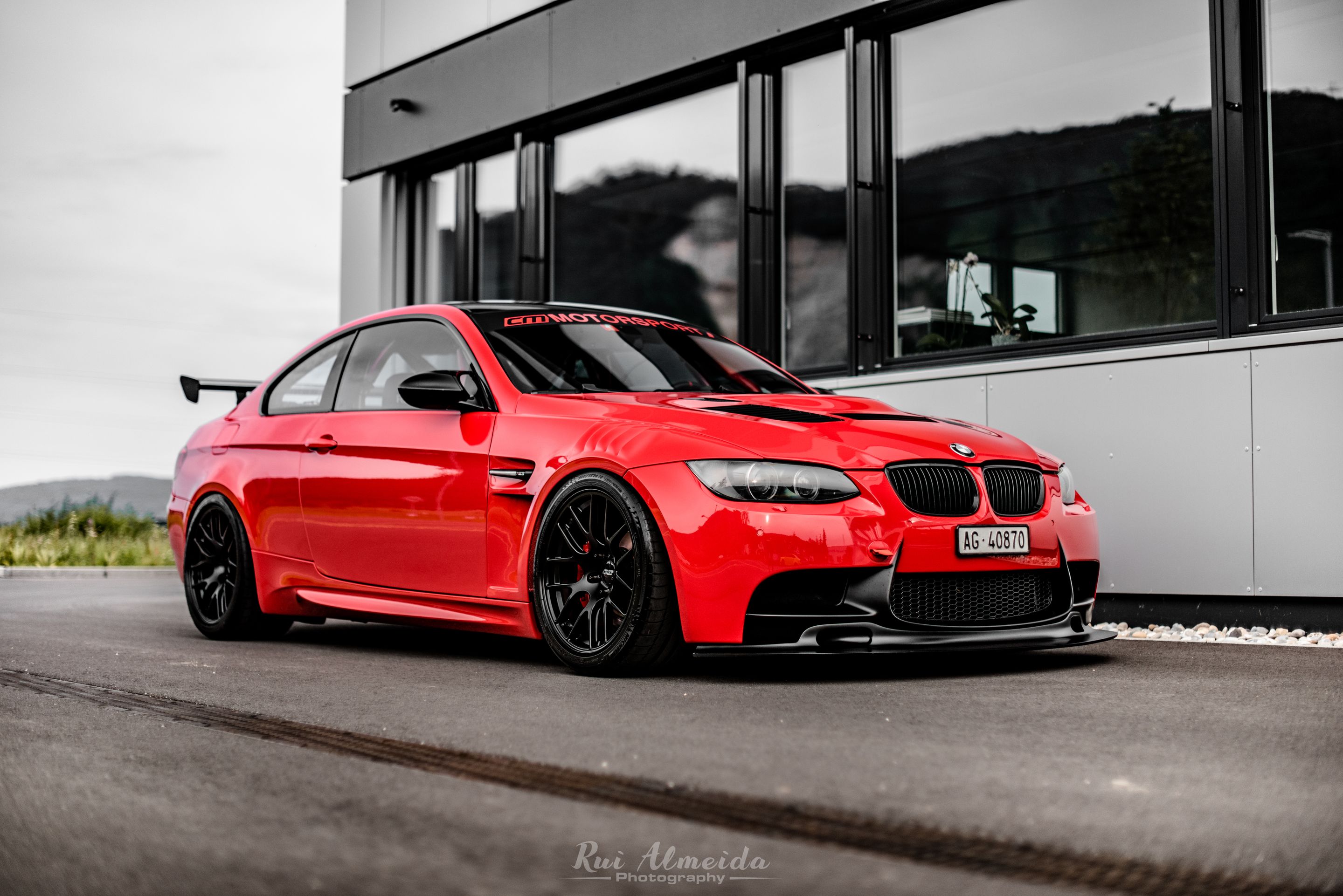 Red BMW E92 Coupe M3 with 18" EC-7R Apex wheels in Satin Black