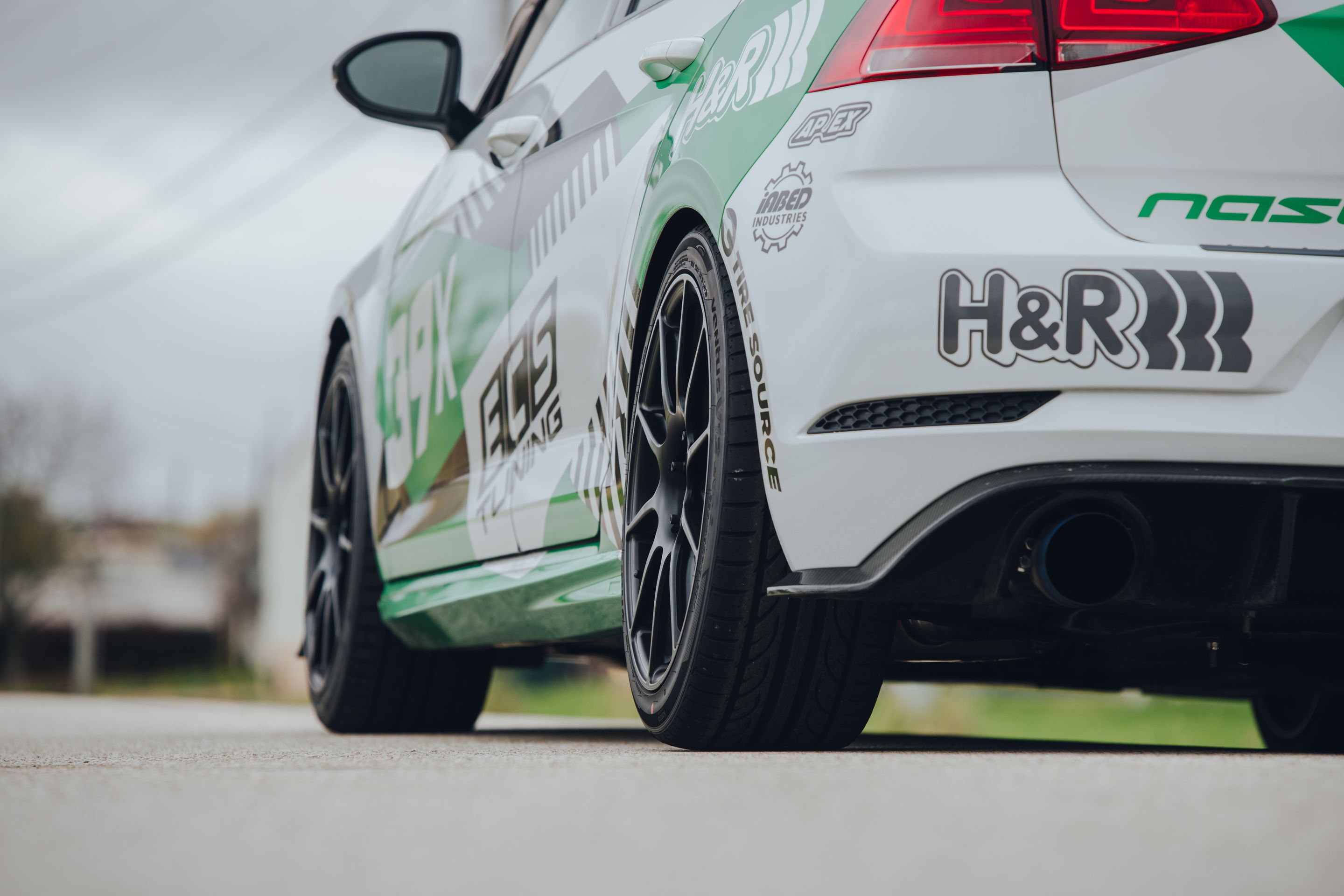 Race Livery VW MK7 GTI with 18" SM-10 Apex wheels in Satin Black