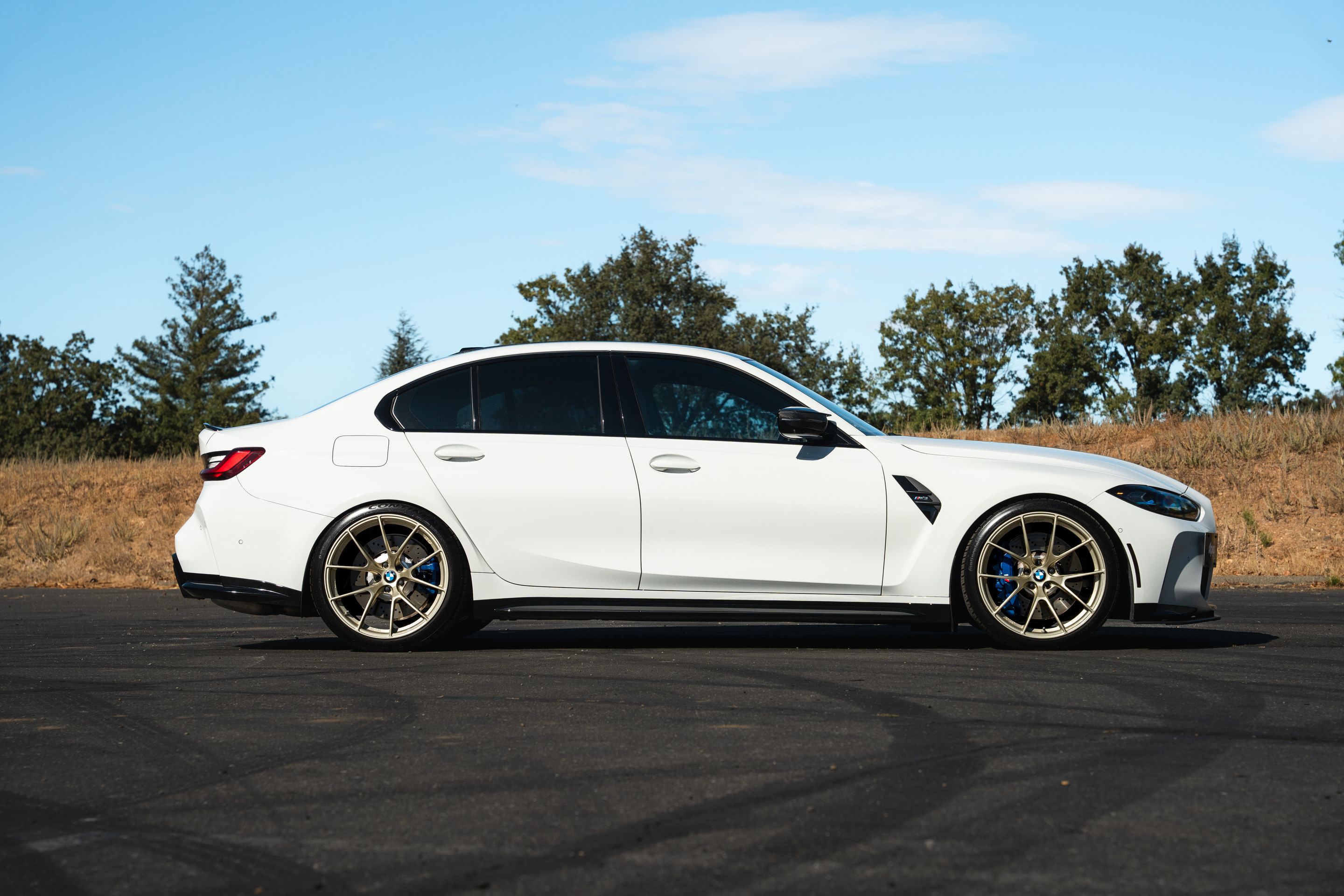 White BMW G80 M3 with 20" VS-5RS Apex wheels in Motorsport Gold