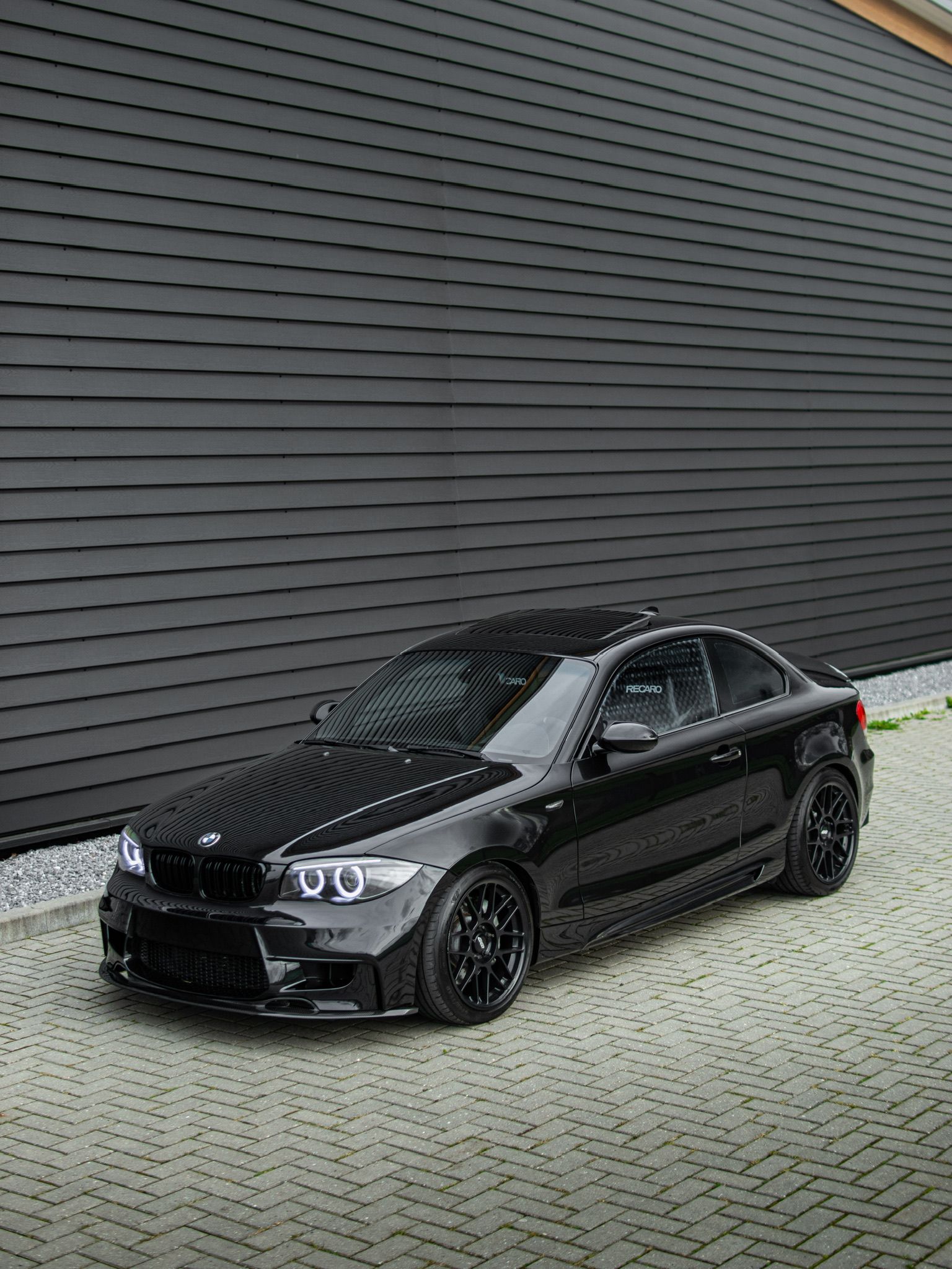 Black BMW E82 Coupe 1 Series with 18" ARC-8 Apex wheels in Satin Black