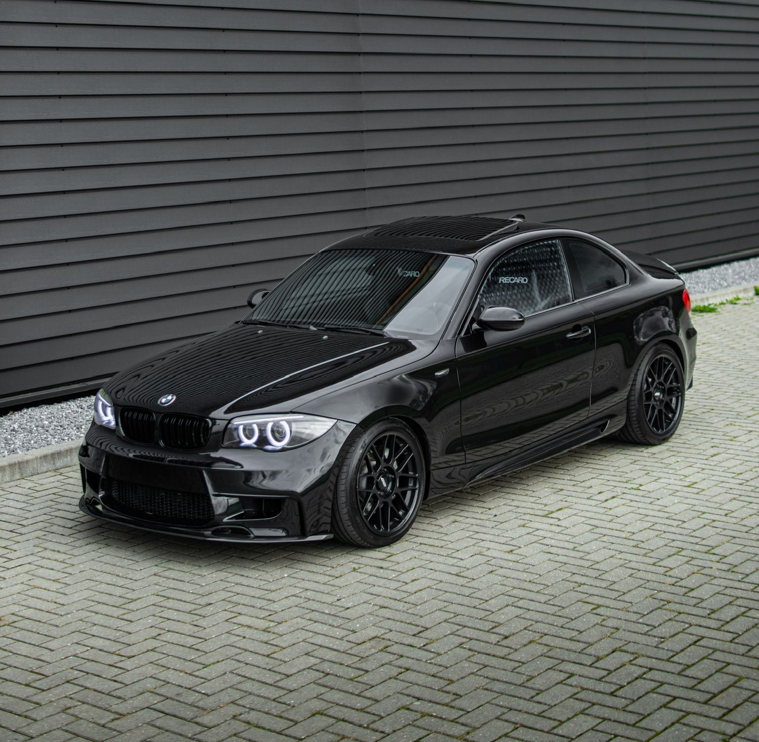 Black BMW E82 Coupe 1 Series with 18" ARC-8 Apex wheels in Satin Black