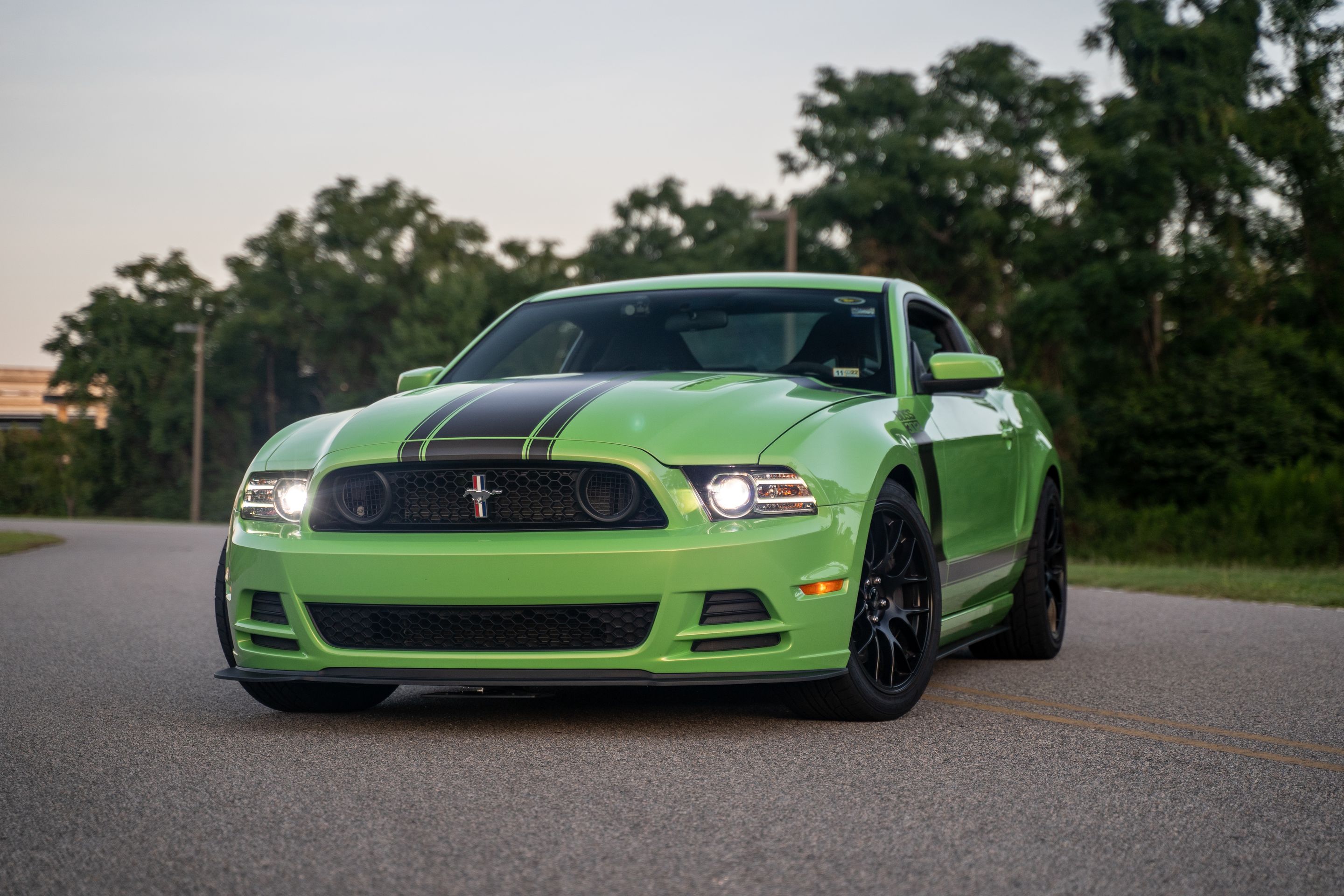 Green Ford S197 Mustang Boss 302 with 19" EC-7 Apex wheels in Satin Black