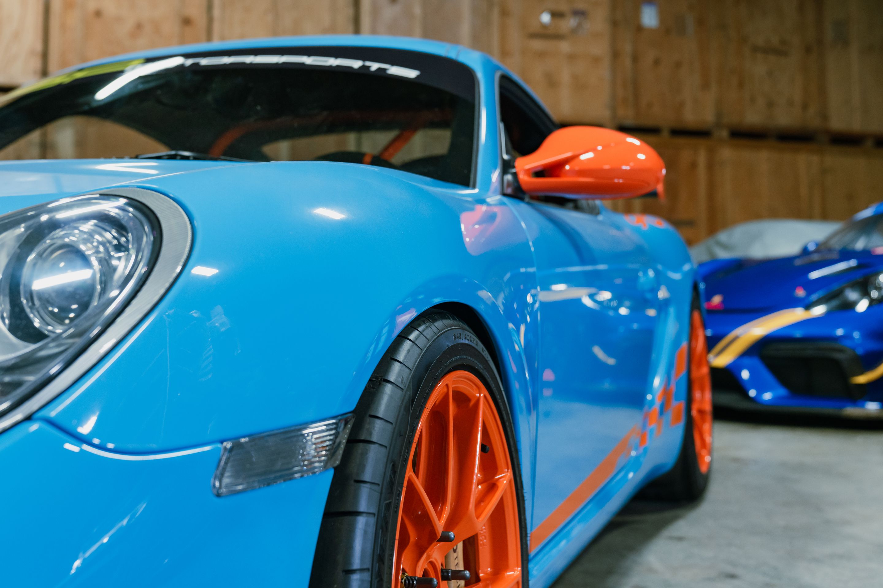 Blue Porsche 987 Cayman S with 18" VS-5RS Apex wheels in Custom Finish