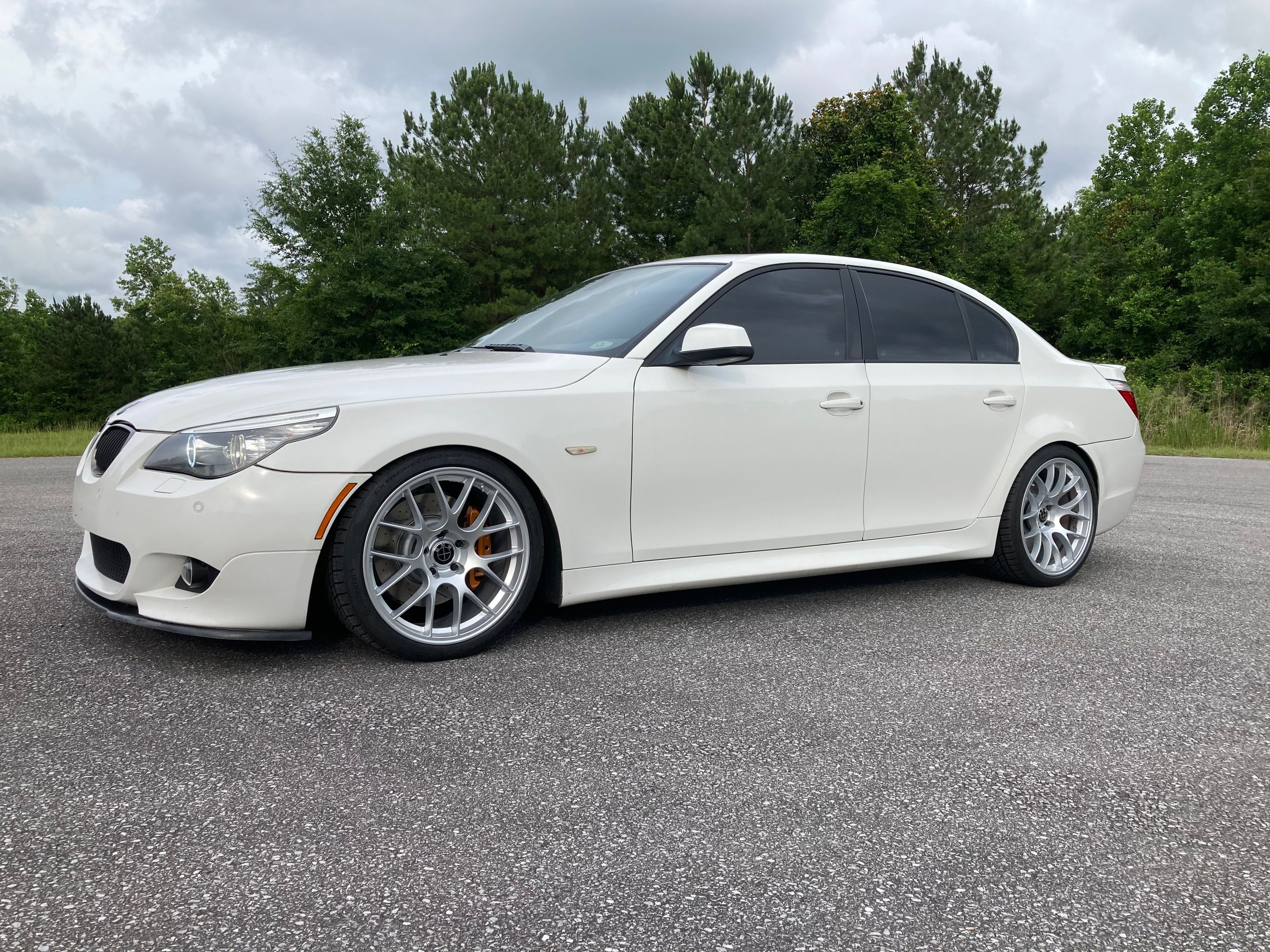 White BMW E60 Sedan 5 Series with 19" EC-7 Apex wheels in Race Silver