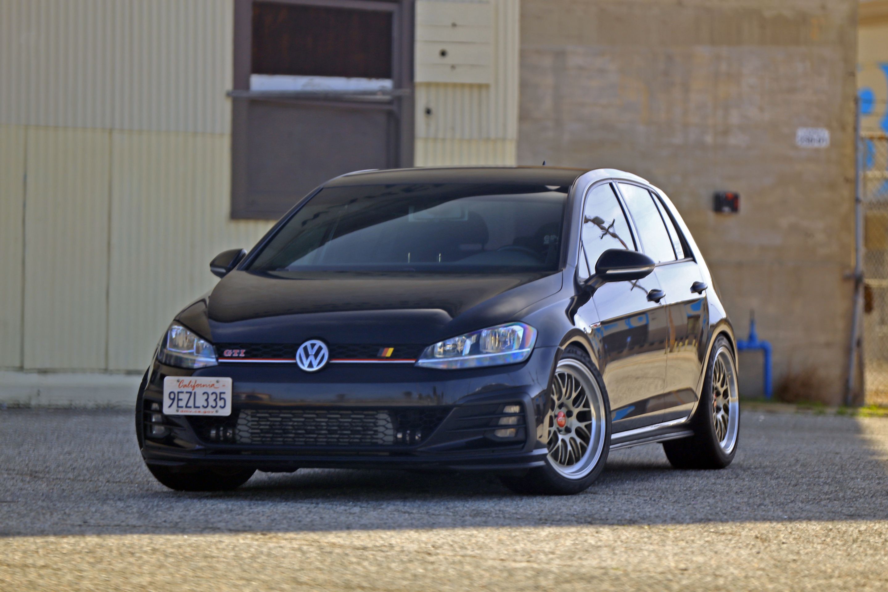Black VW MK7 GTI with 18" ML-10RT Apex wheels in Machined Lip Gloss Motorsport Gold