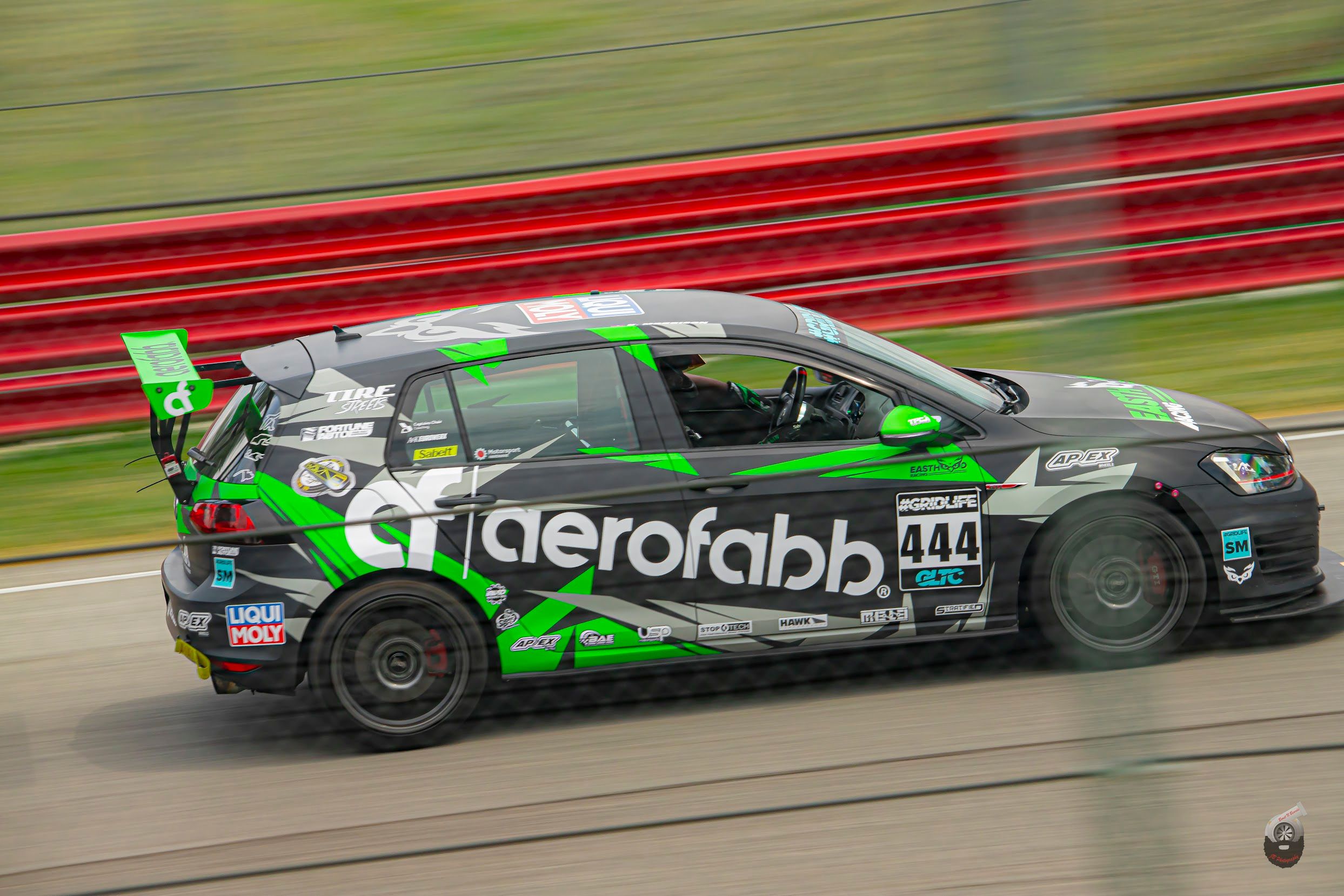 Race Livery VW MK7 GTI with 18" SM-10 Apex wheels in Satin Black