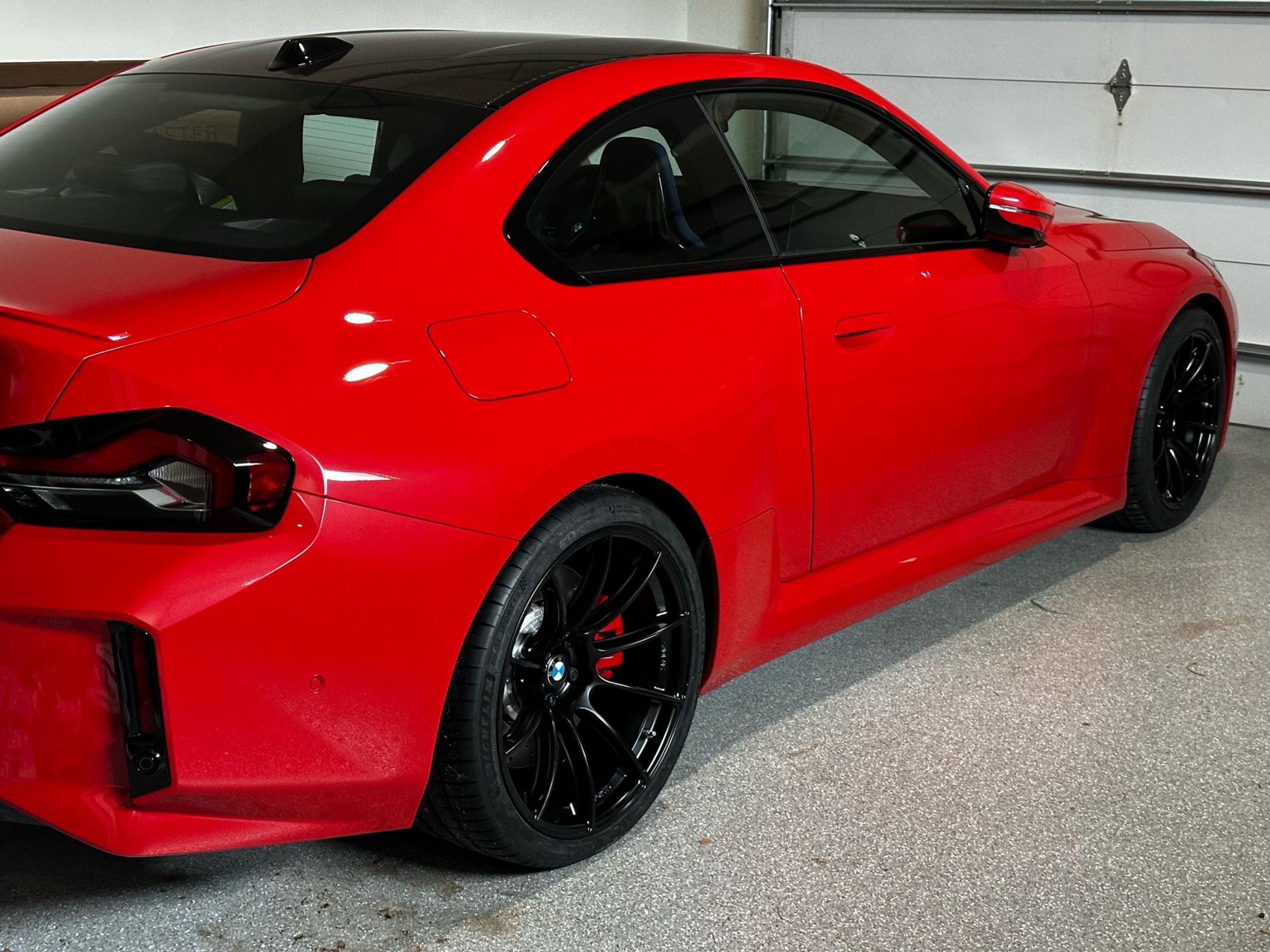 Red BMW G87 M2 with 19"/20" SM-10RS Apex wheels in Satin Black