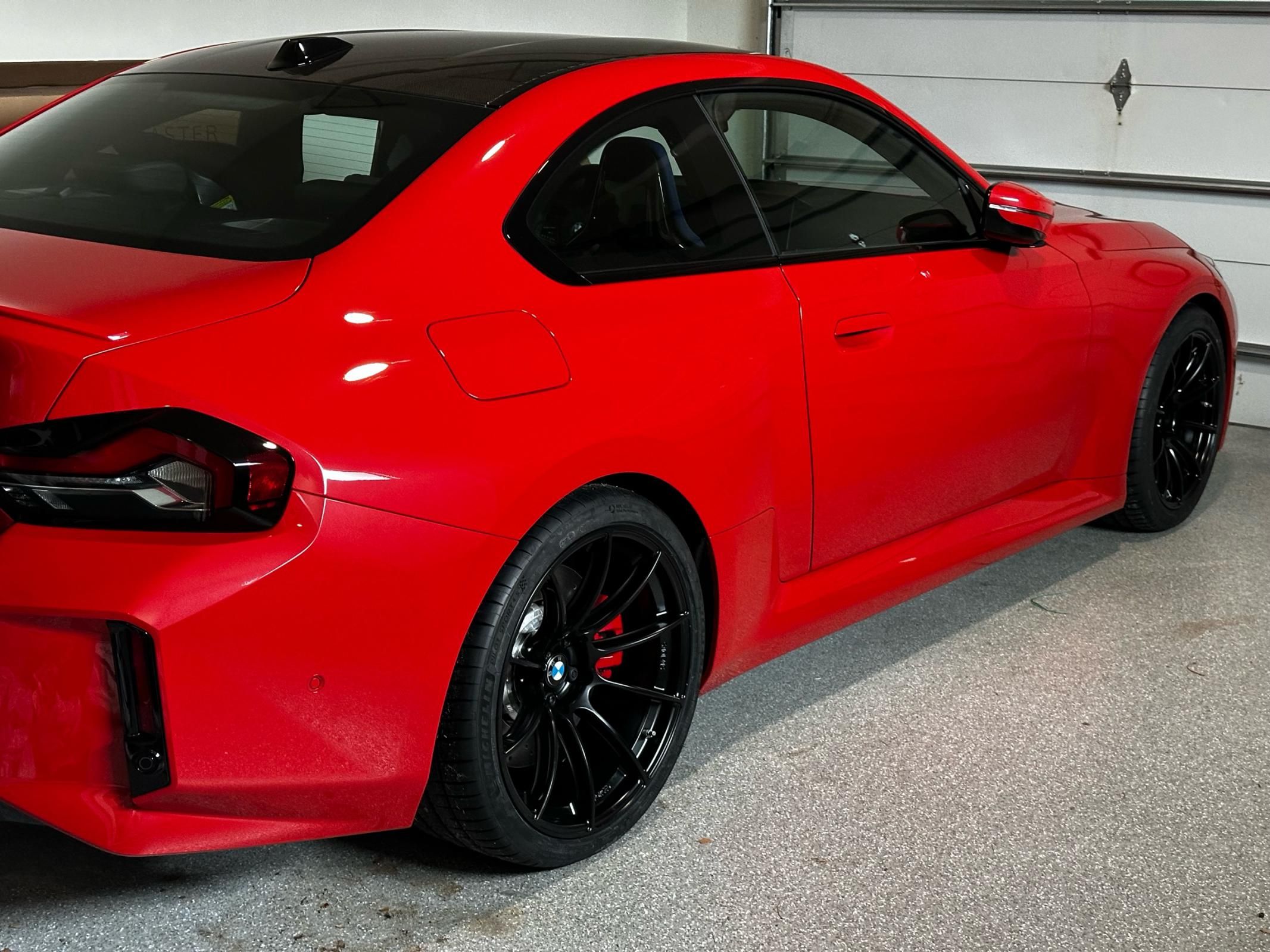 Red BMW G87 M2 with 19"/20" SM-10RS Apex wheels in Satin Black