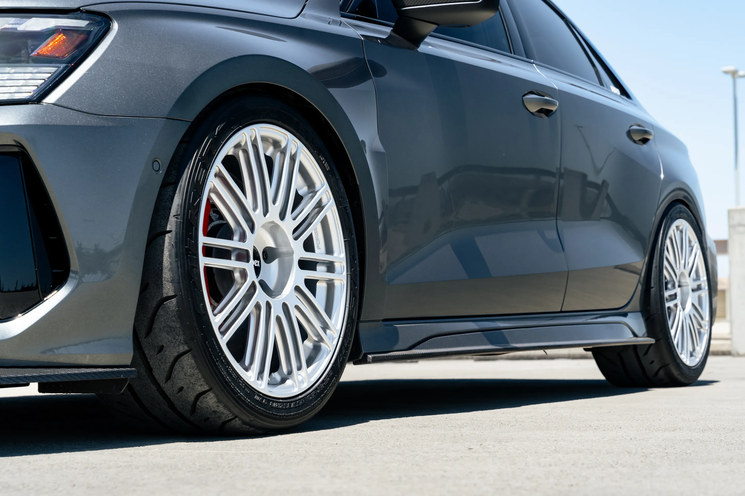Grey Audi 8Y RS 3 with 18" TC-10RT Apex wheels in Race Silver