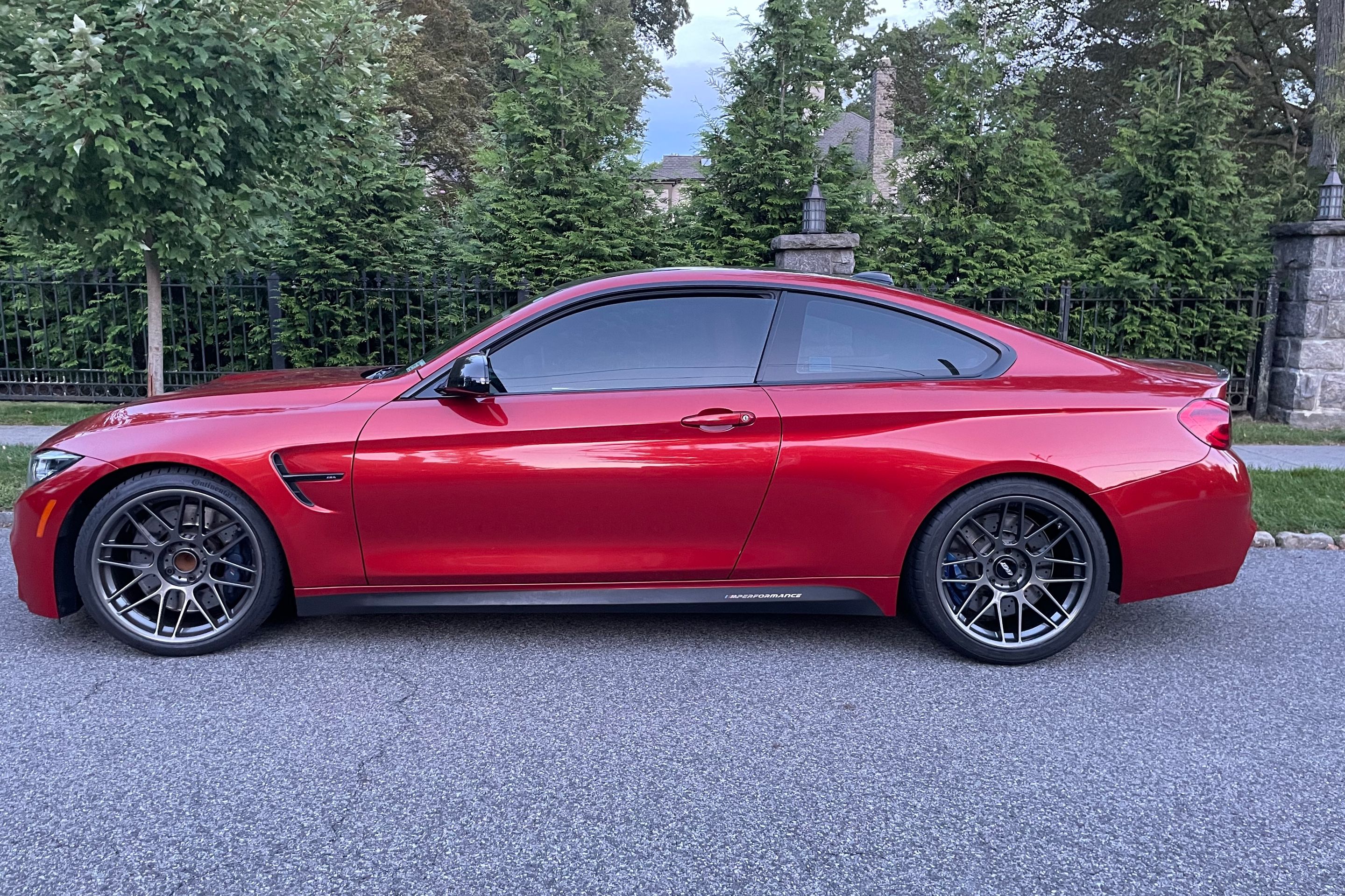 Red BMW F82 Coupe M4 with 19" ARC-8 Apex wheels in Anthracite
